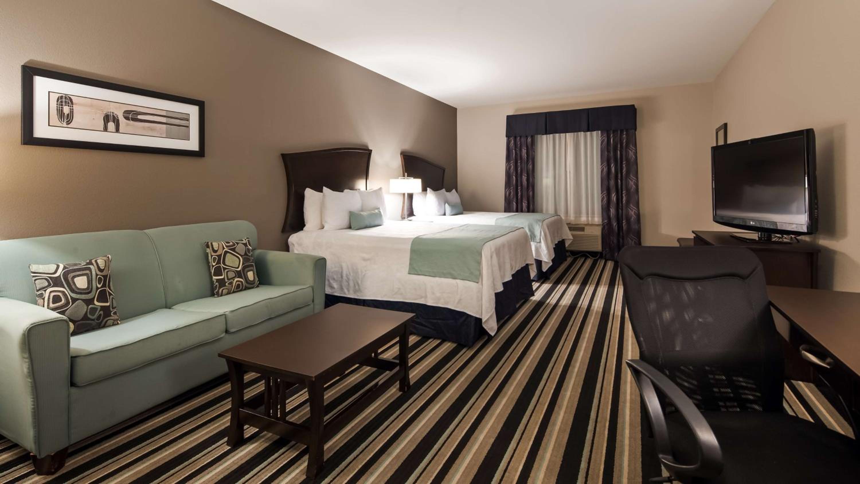 Queen Suite with Two Queen Beds and Sofa Bed