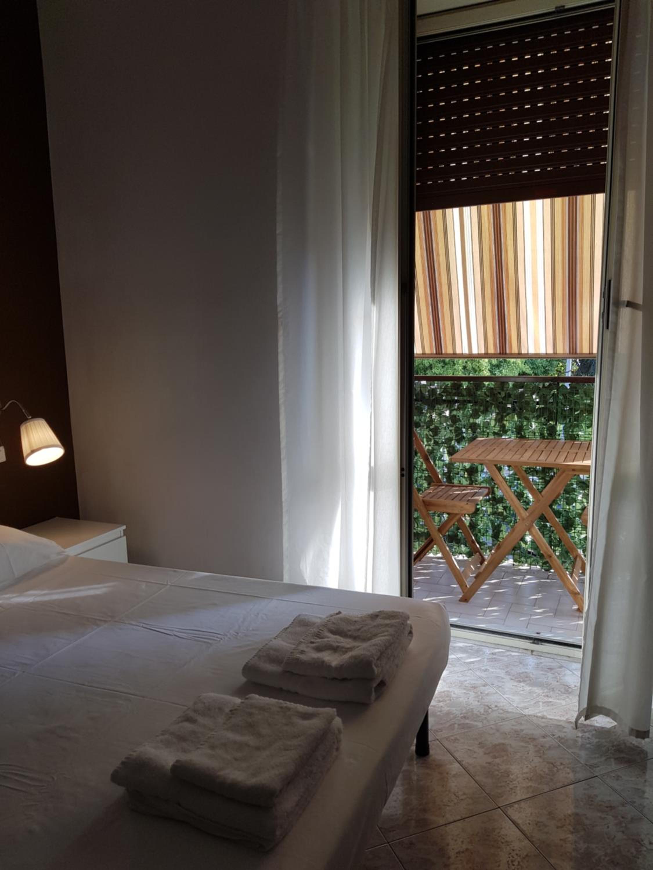 Quadruple Room With Balcony And Private Bathroom 