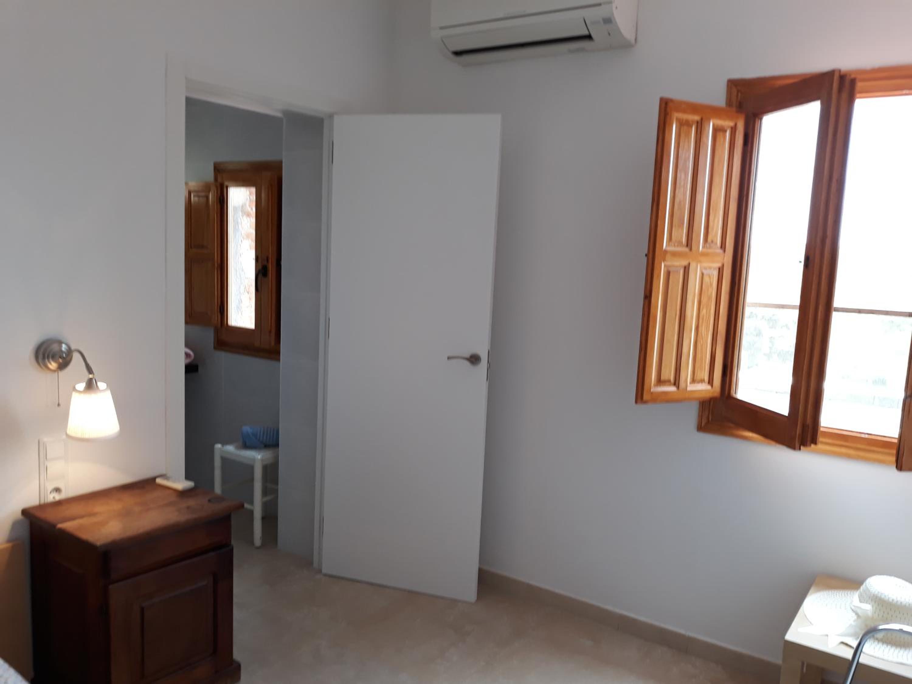 Habitación Triple con Baño Privado