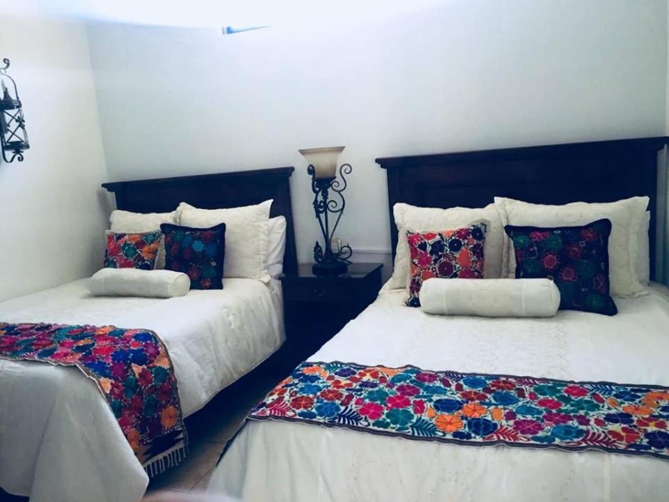 Deluxe Queen Room With Two Queen Beds photo 1