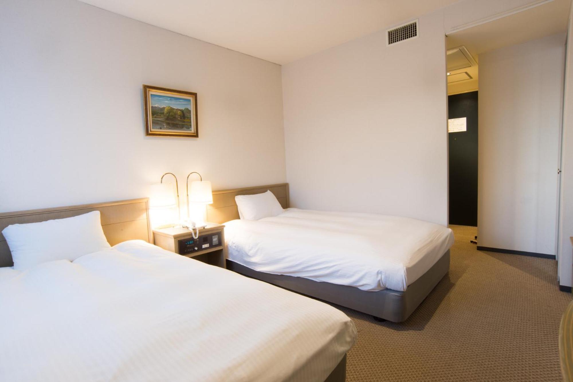 Twin Room - Photo 1