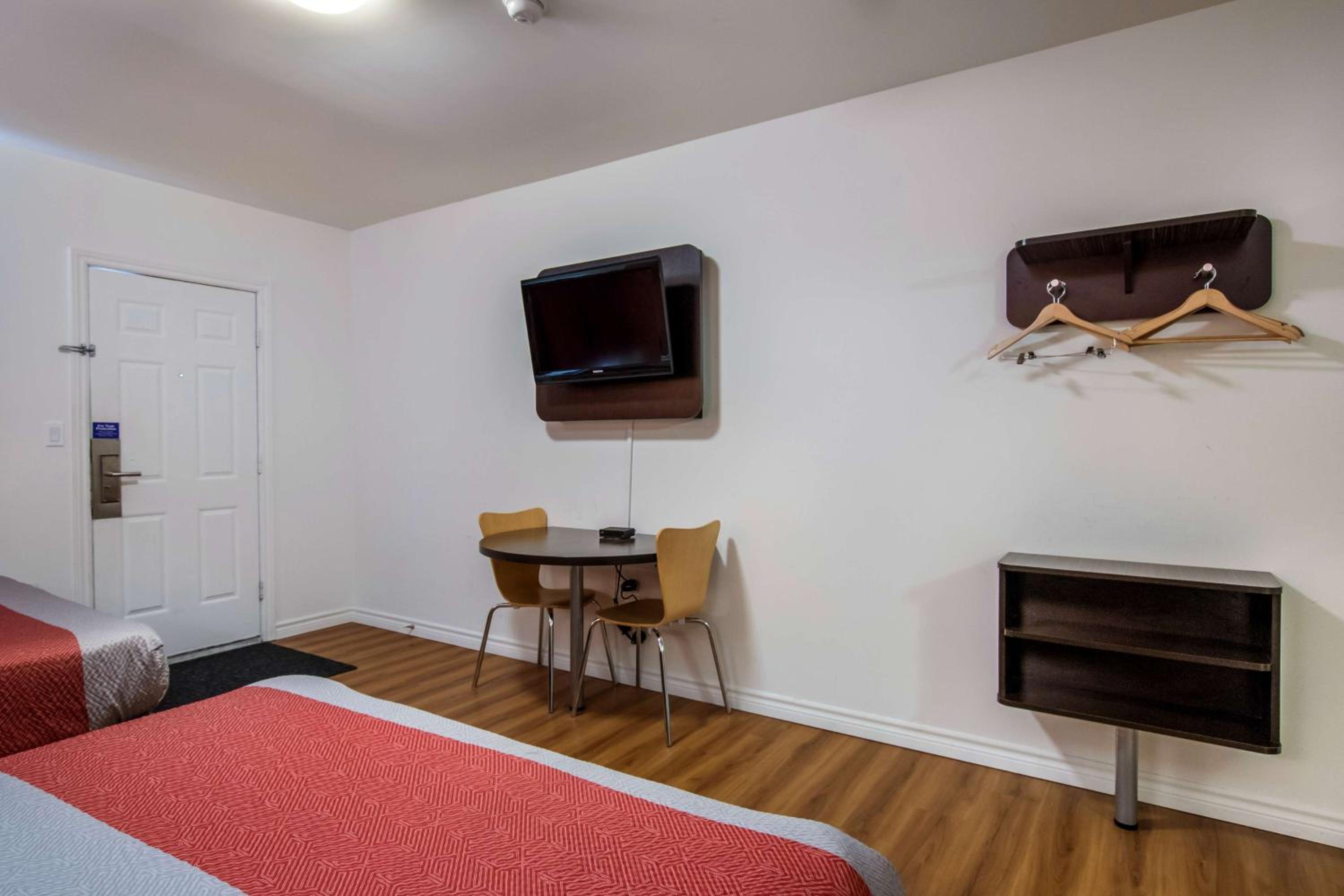 Deluxe Queen Room with Two Queen Beds - Non-Smoking photo 1