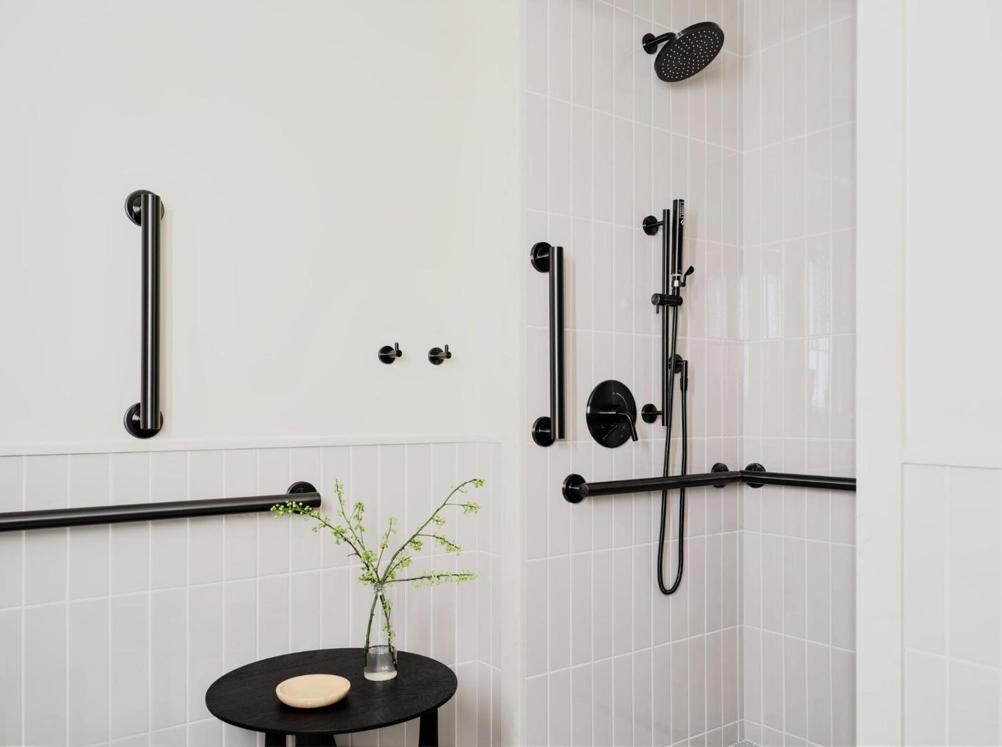 Essential King Room with Roll-in Shower - Mobility Accessible photo 3