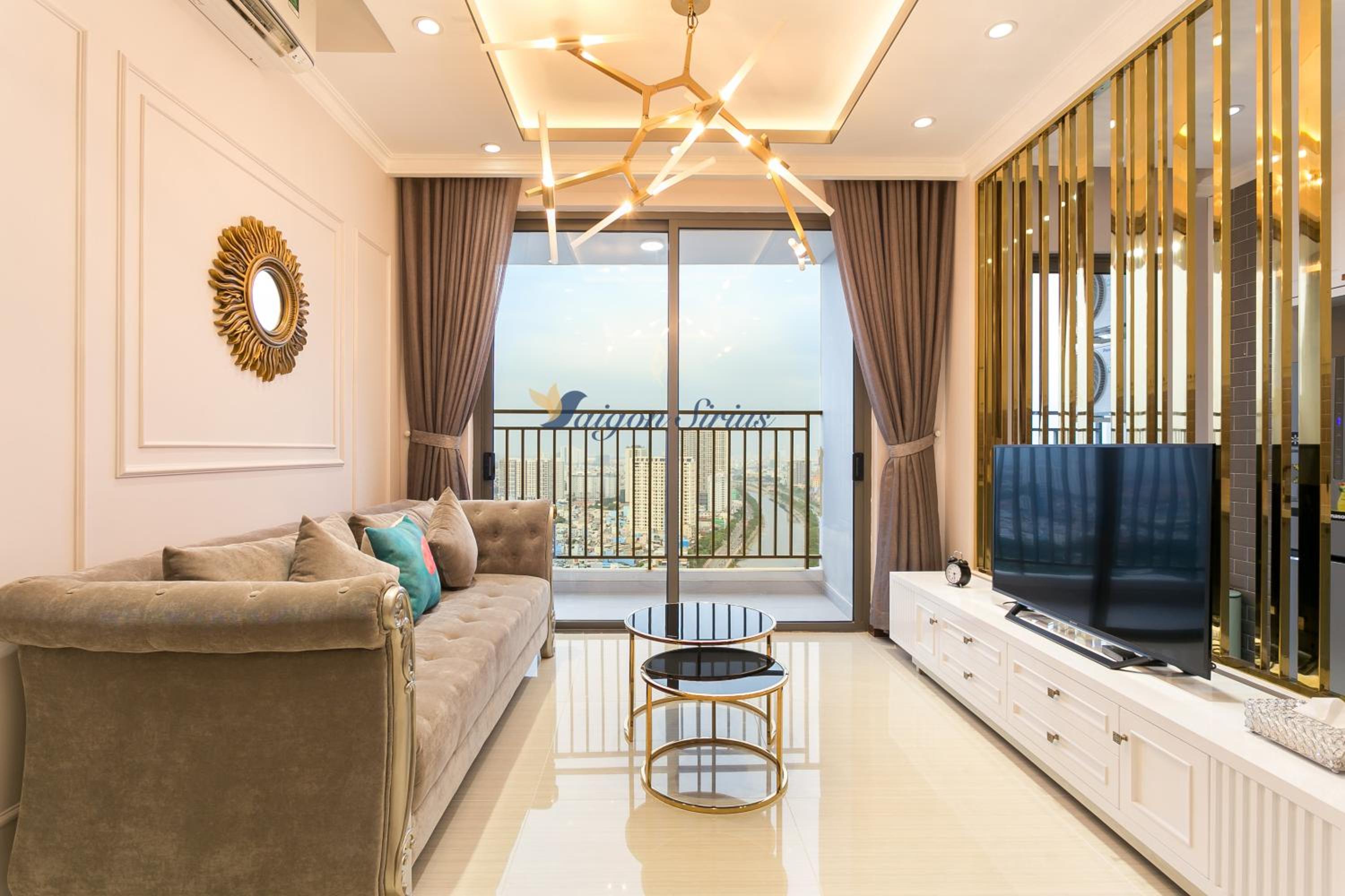 Three-Bedroom Apartment with Balcony and River View