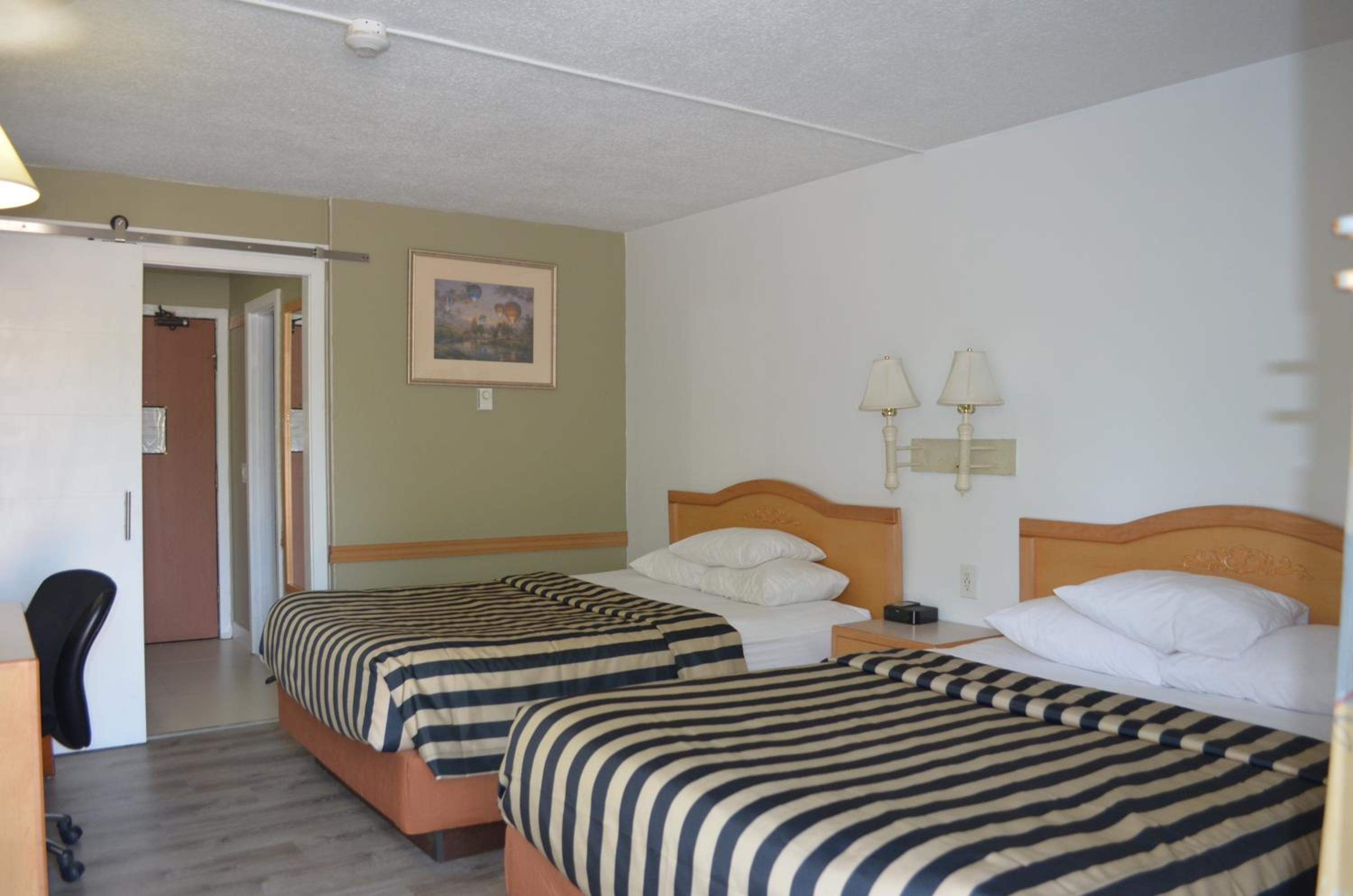 Queen Room with Two Queen Beds - Photo 1