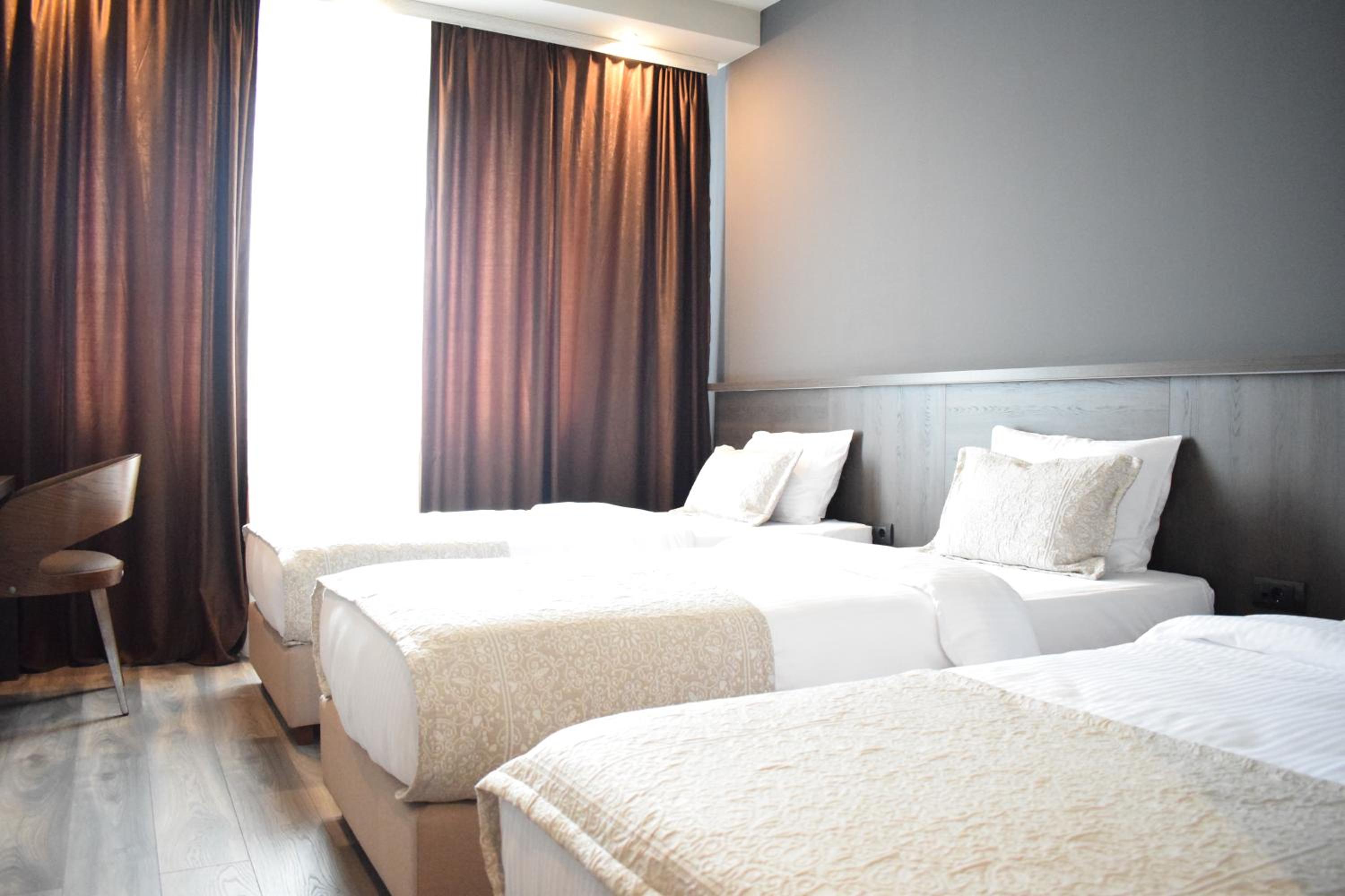 Superior Triple Room - Photo 9