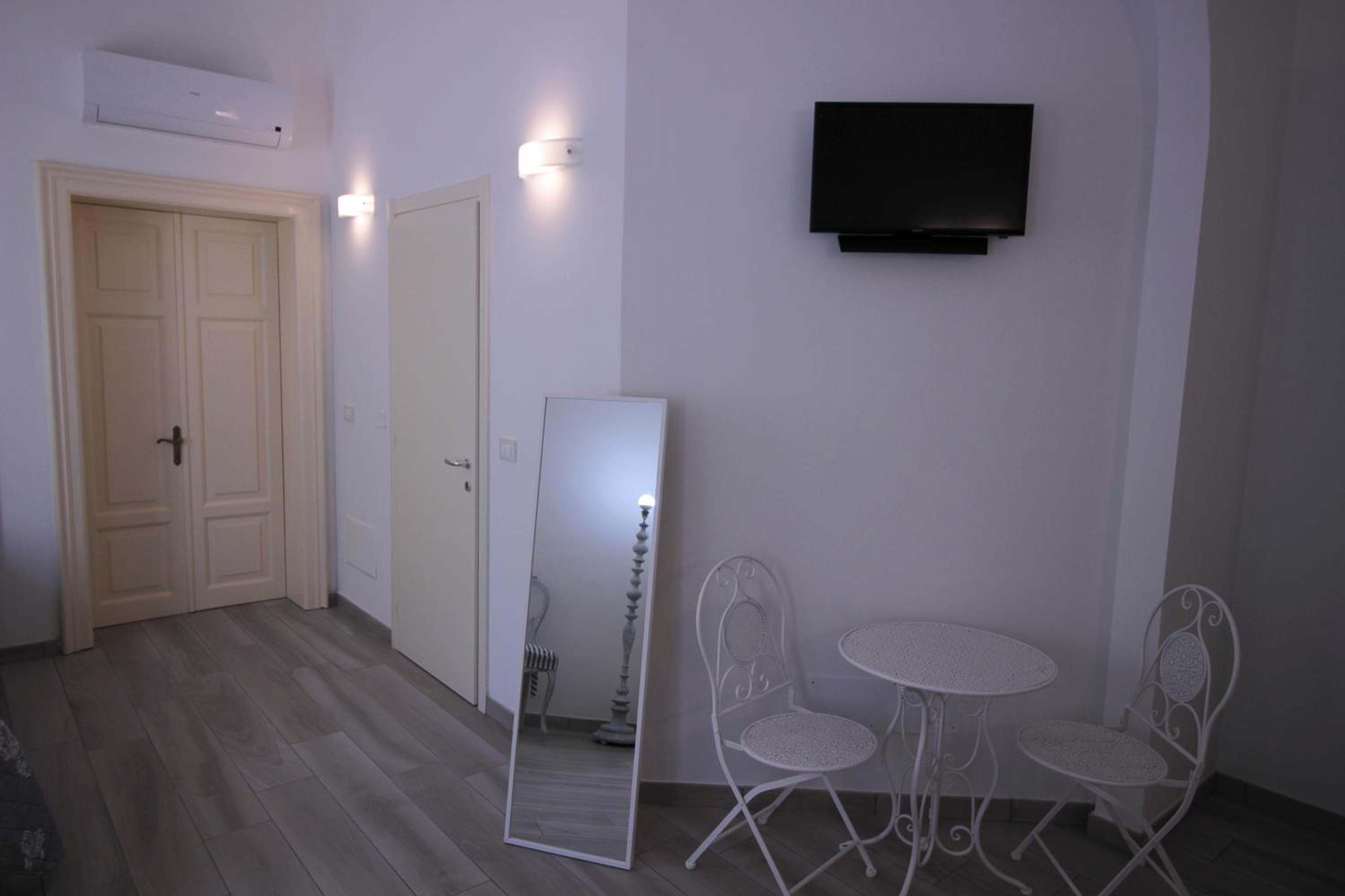 Deluxe Triple Room - Photo 17