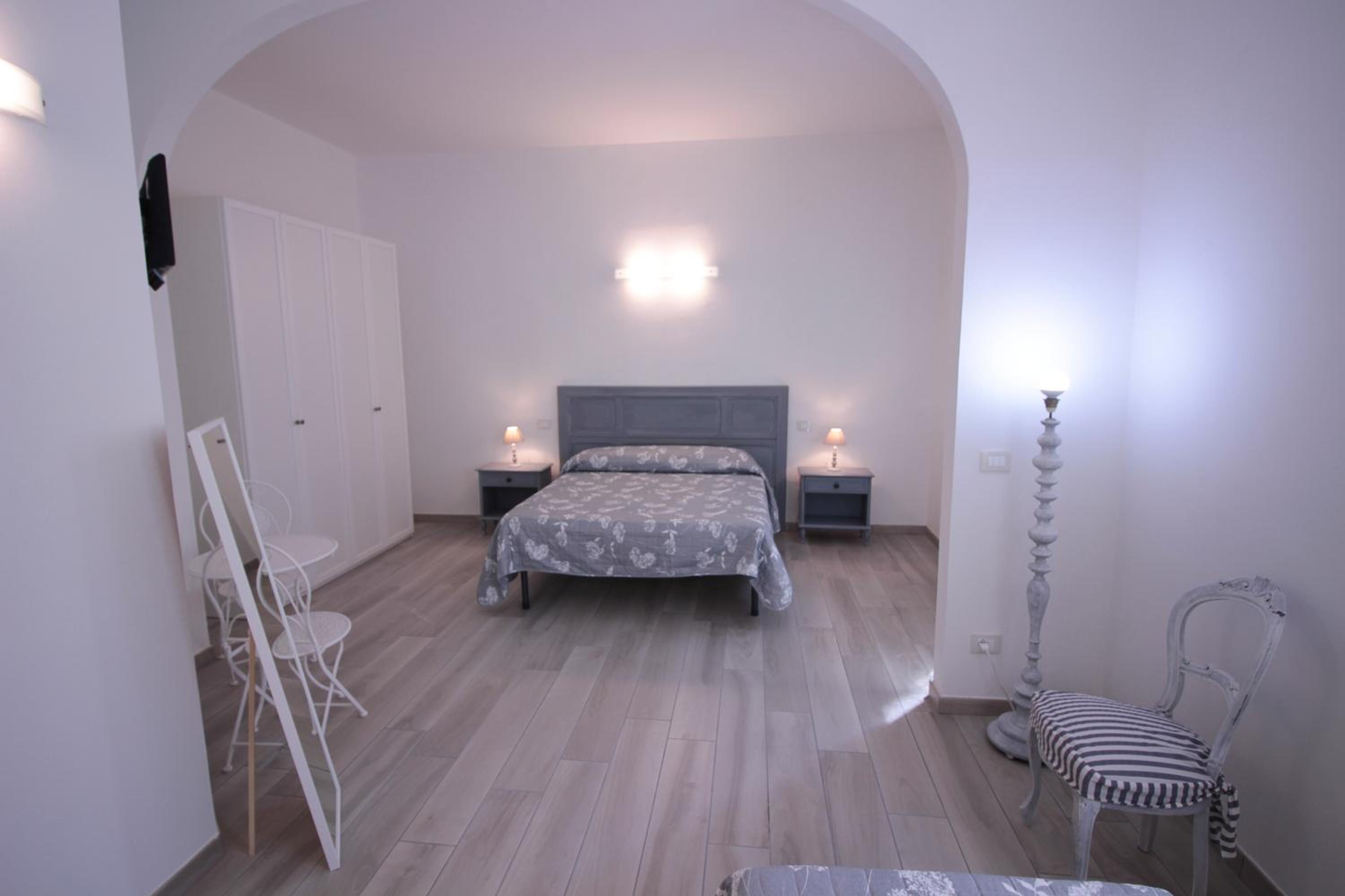 Deluxe Triple Room - Photo 16
