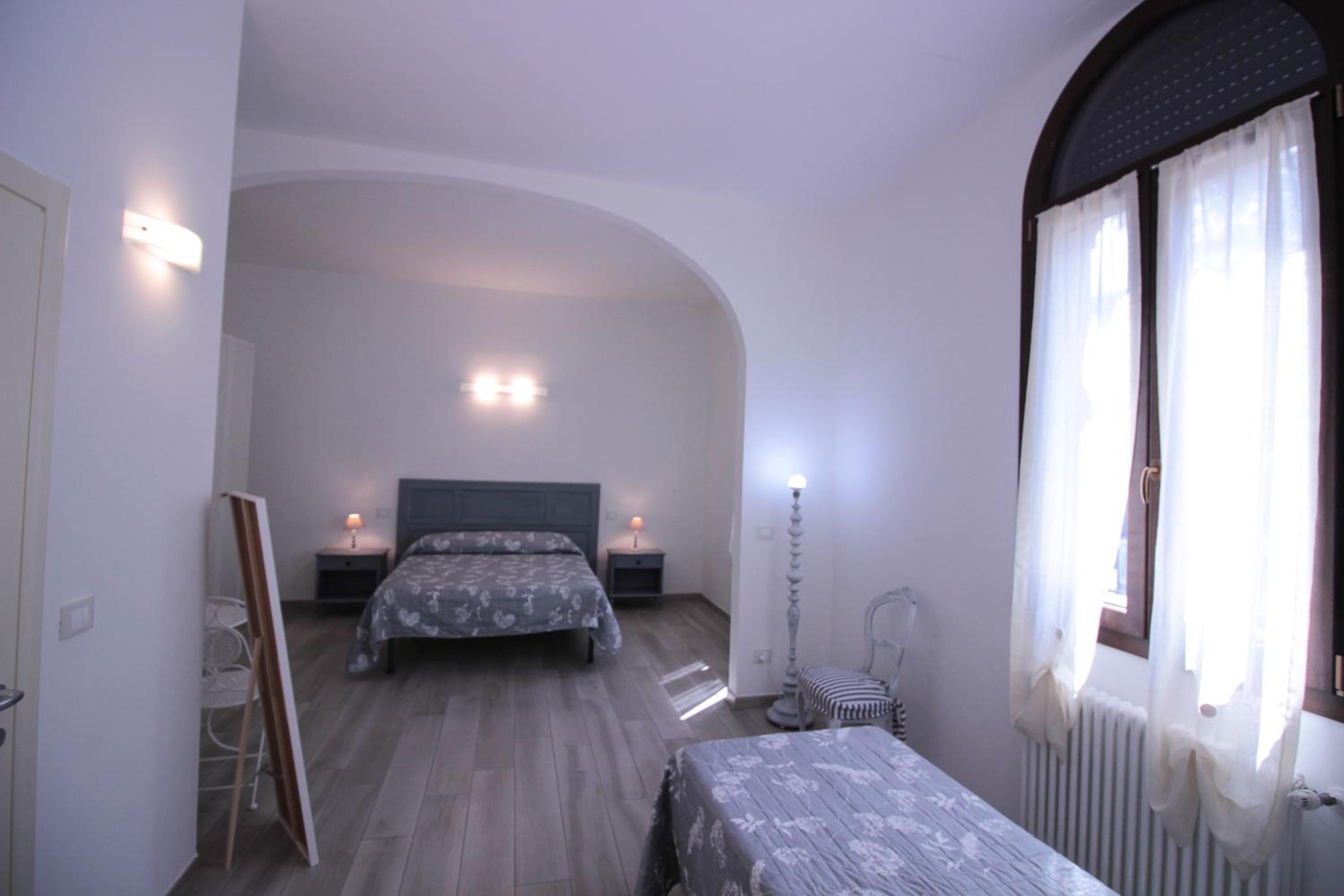 Deluxe Triple Room - Photo 11
