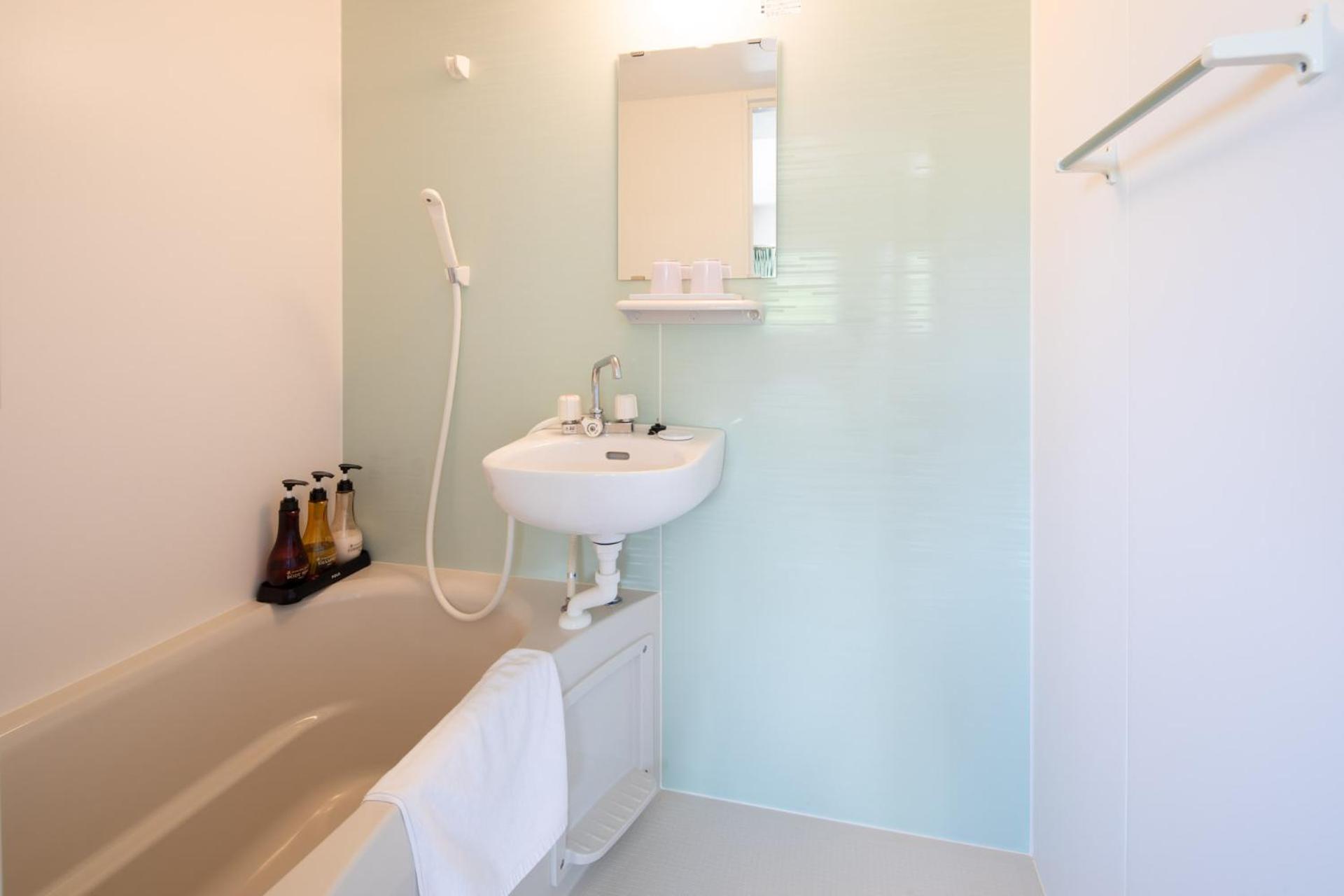 Standard Twin Room - Photo 4