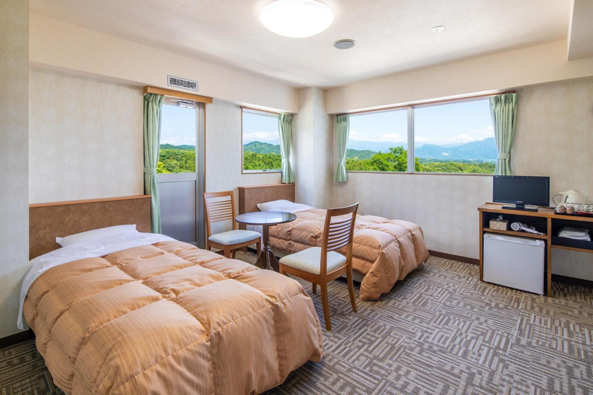Standard Twin Room - Photo 3