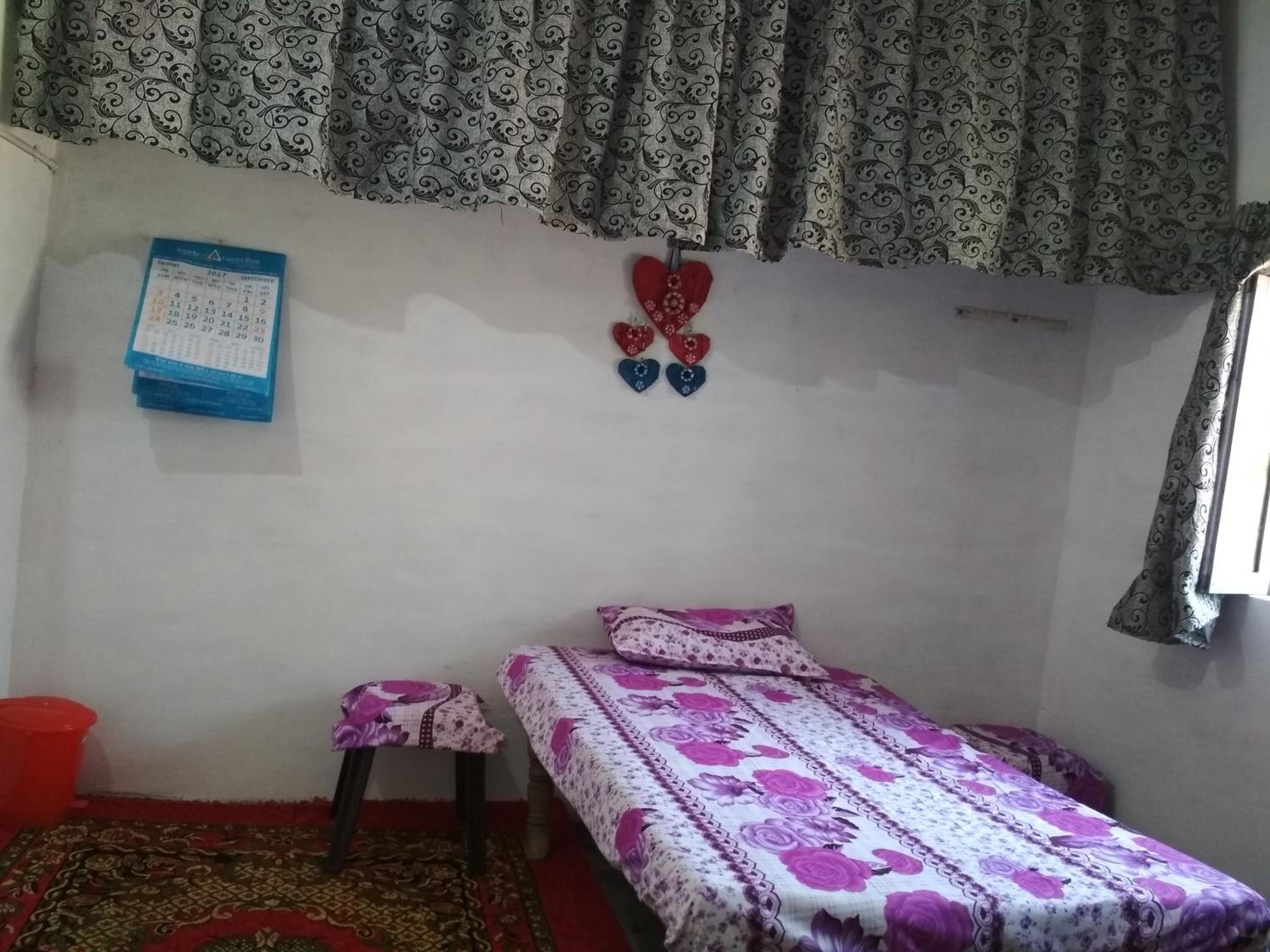 Single Bed in Dormitory Room