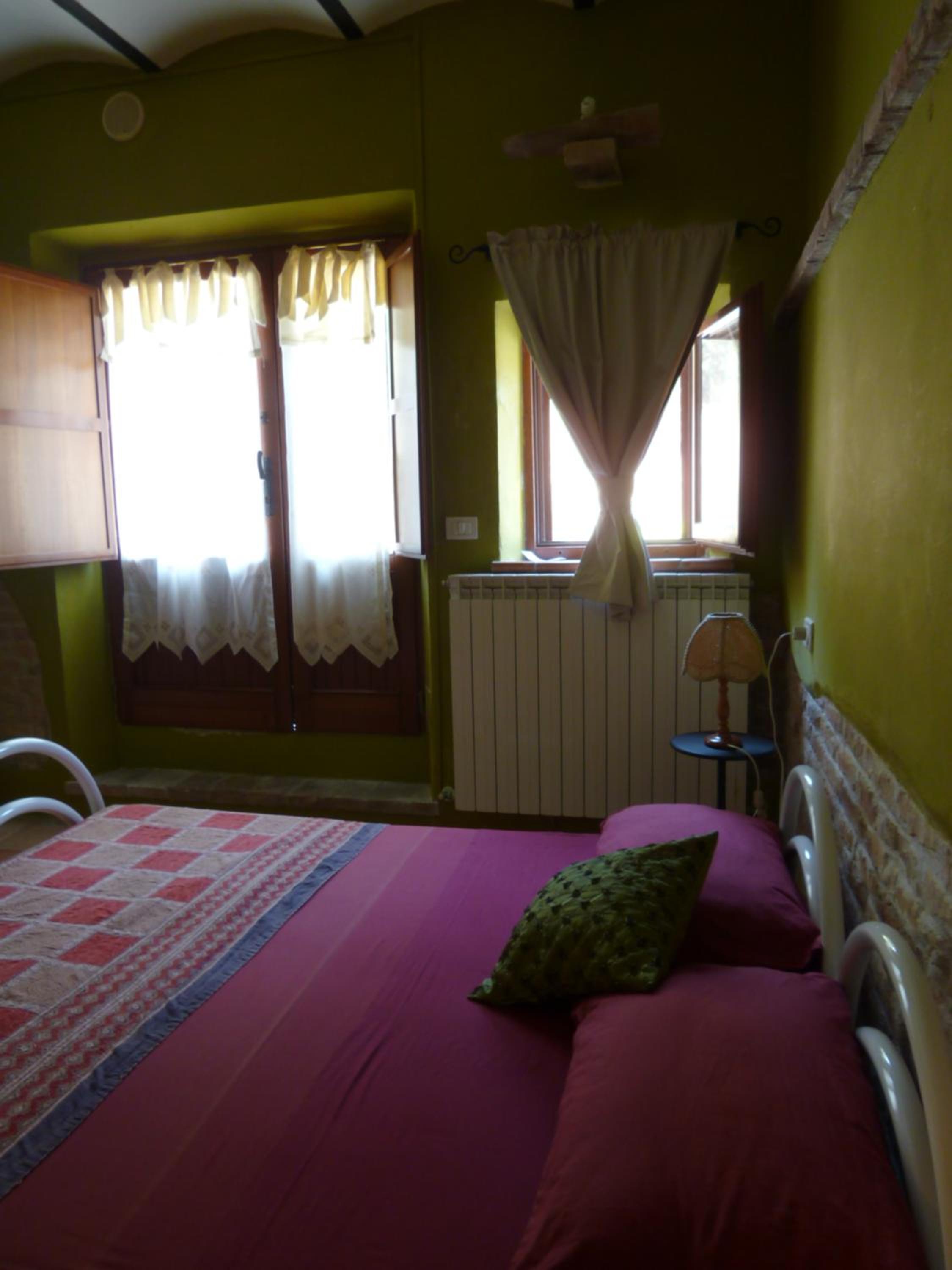 Triple Room with Garden View and Private Bathroom
