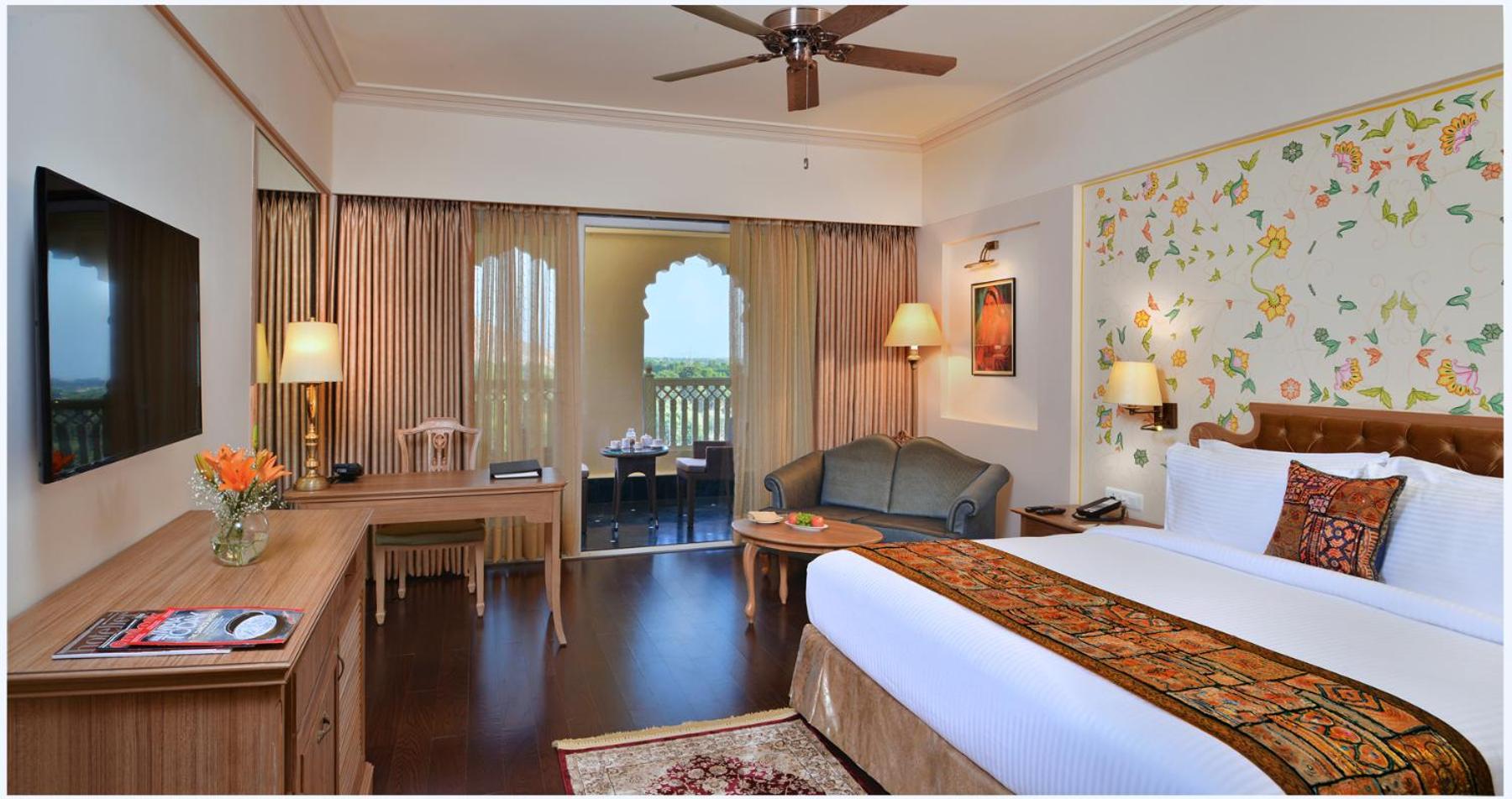 Premium King Room with Balcony: 15% off on Two-way Airport Transfer, 10% off on Food & Beverage services, 10% Discount On Laundry service