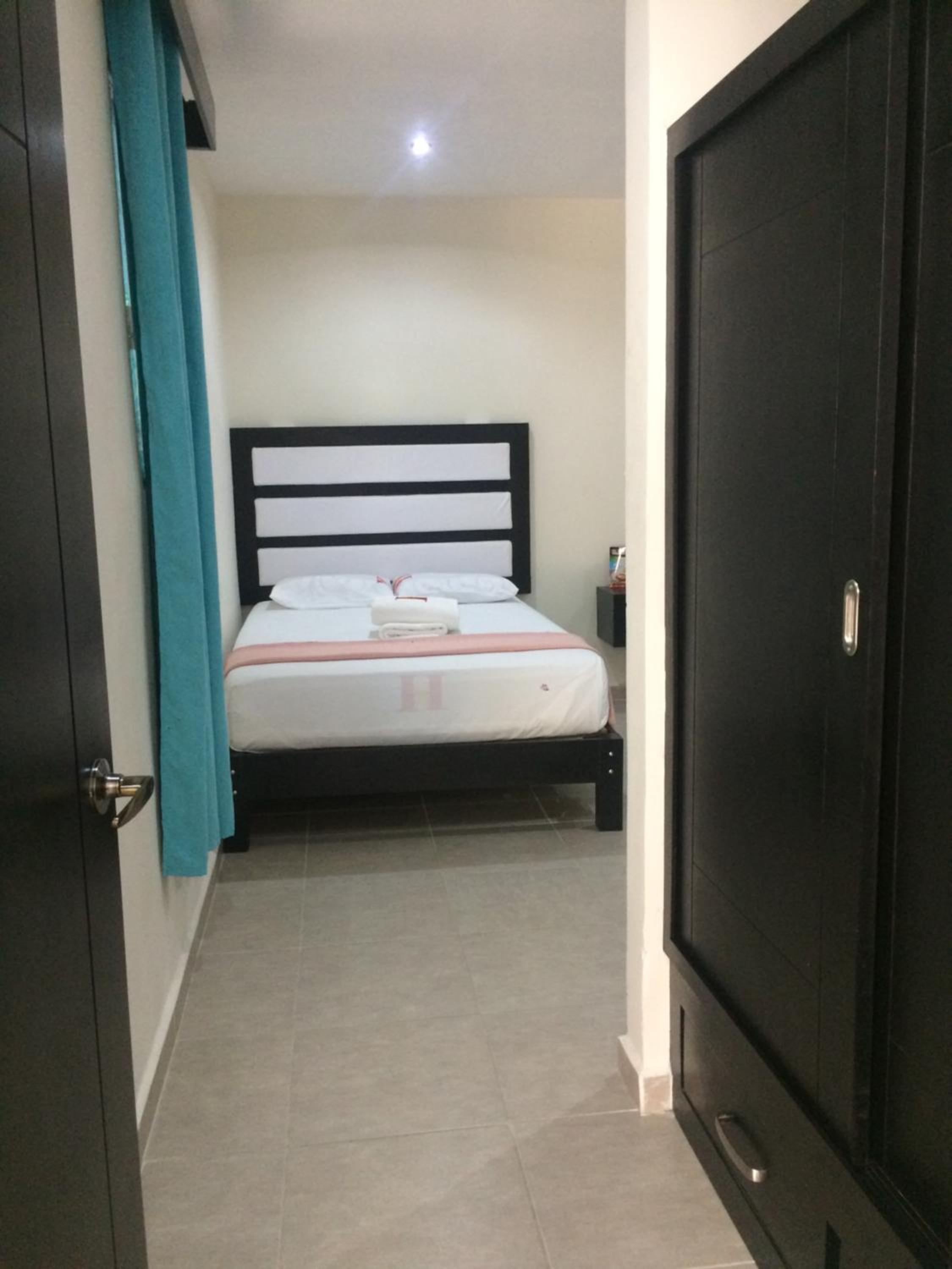 Quadruple Room with Private Bathroom