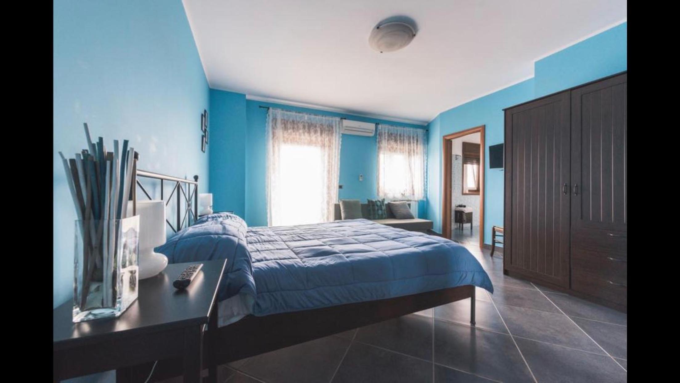 Quadruple Room with Private Bathroom photo 3
