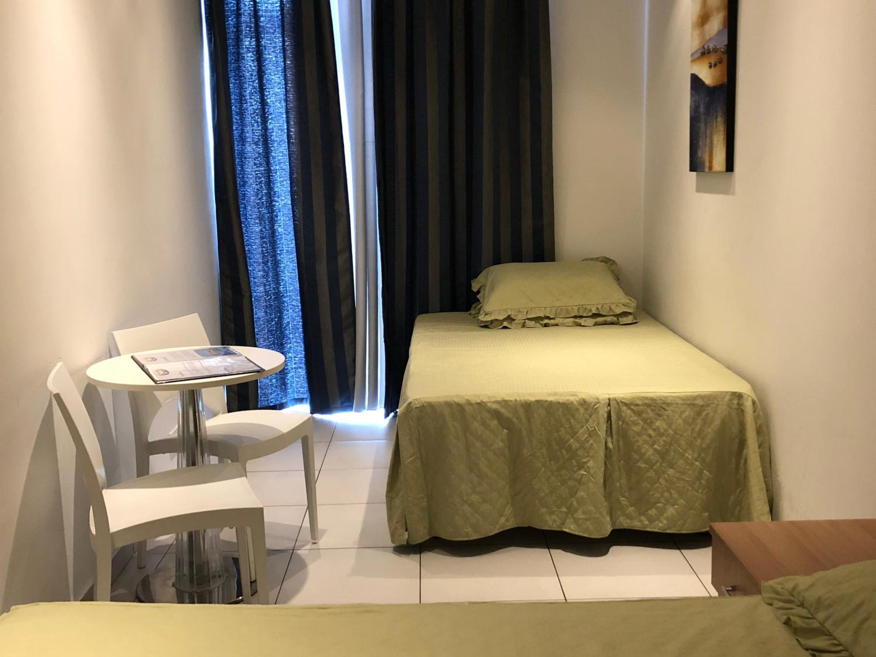 Family Room (2 Adults + 2 Children) with Free Airport Transfer photo 1
