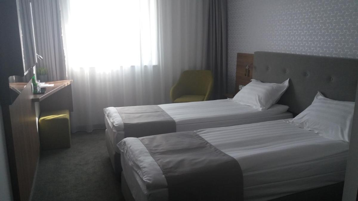 Twin Room - Photo 1