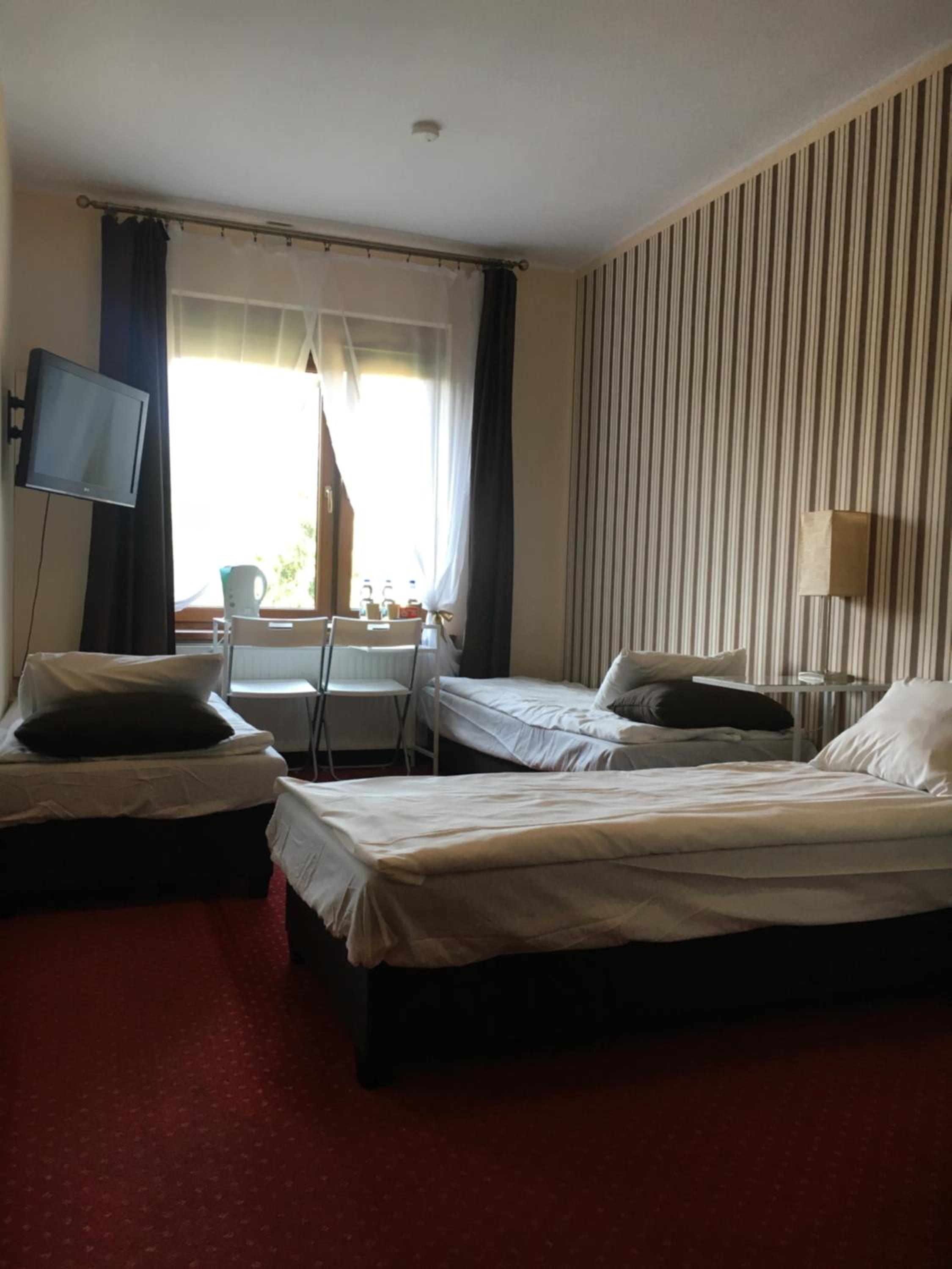 Comfort Triple Room with Shower photo 1