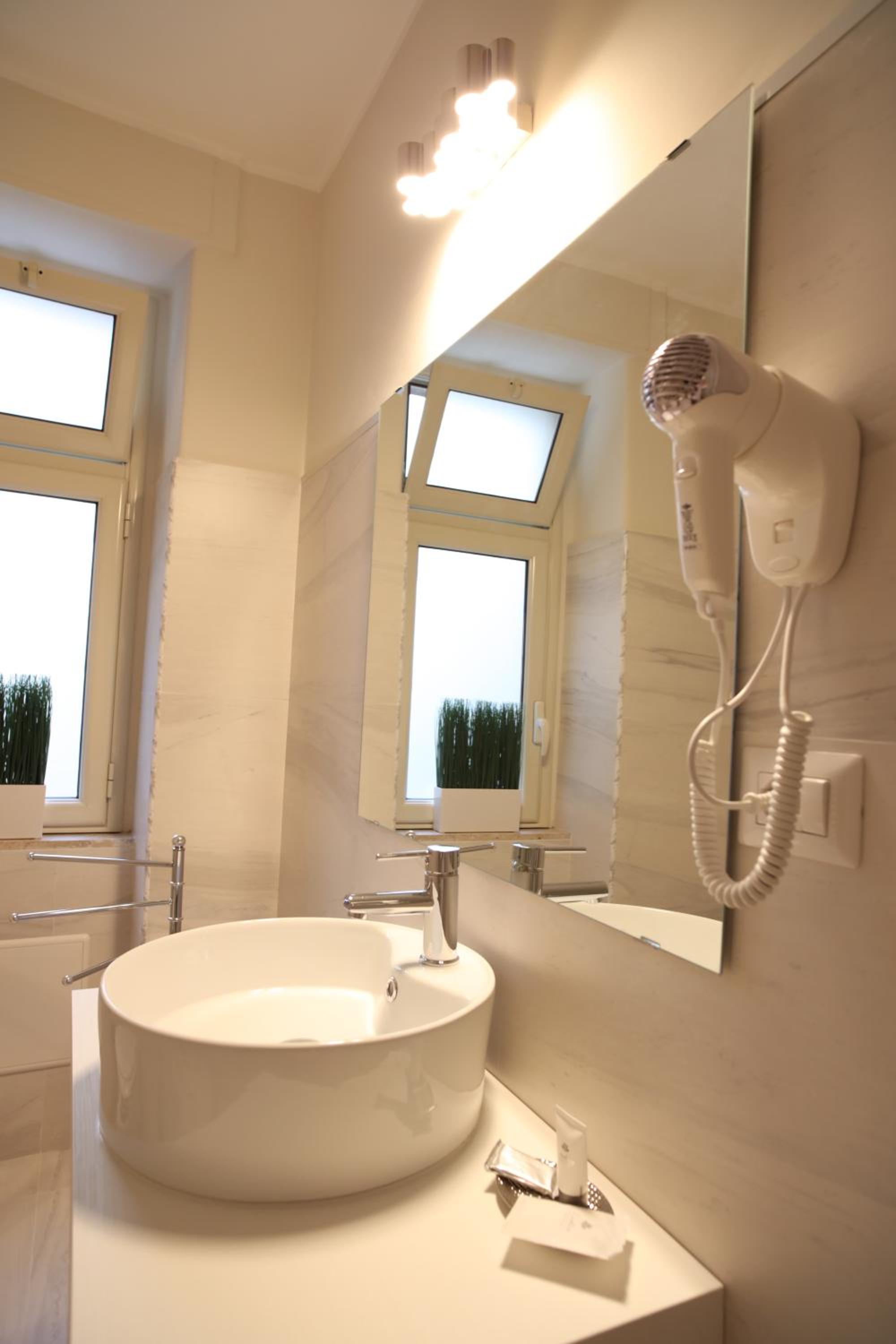 King Suite with Balcony - Photo 8