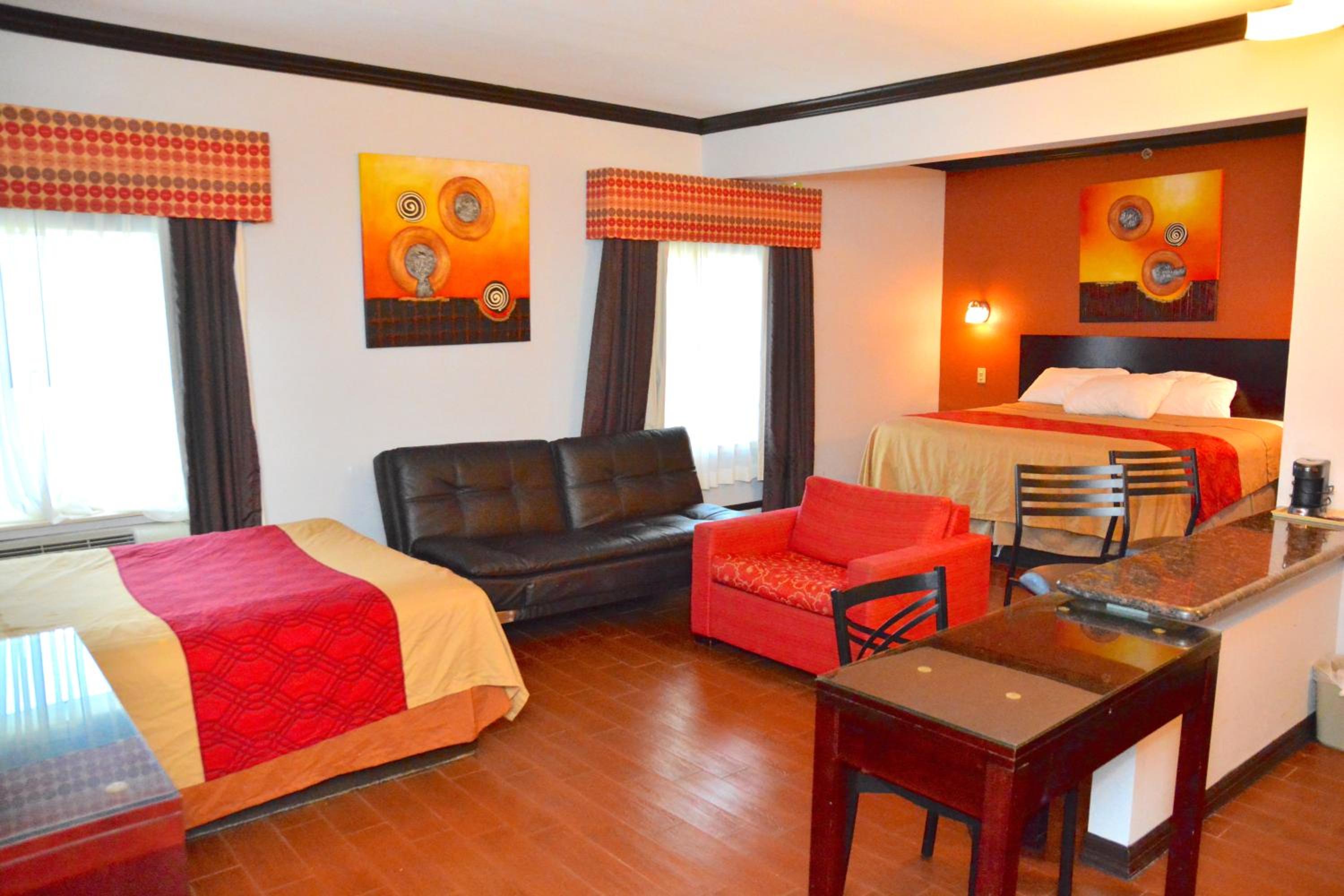 Deluxe King with Kitchenette and Sofa Bed - Photo 1