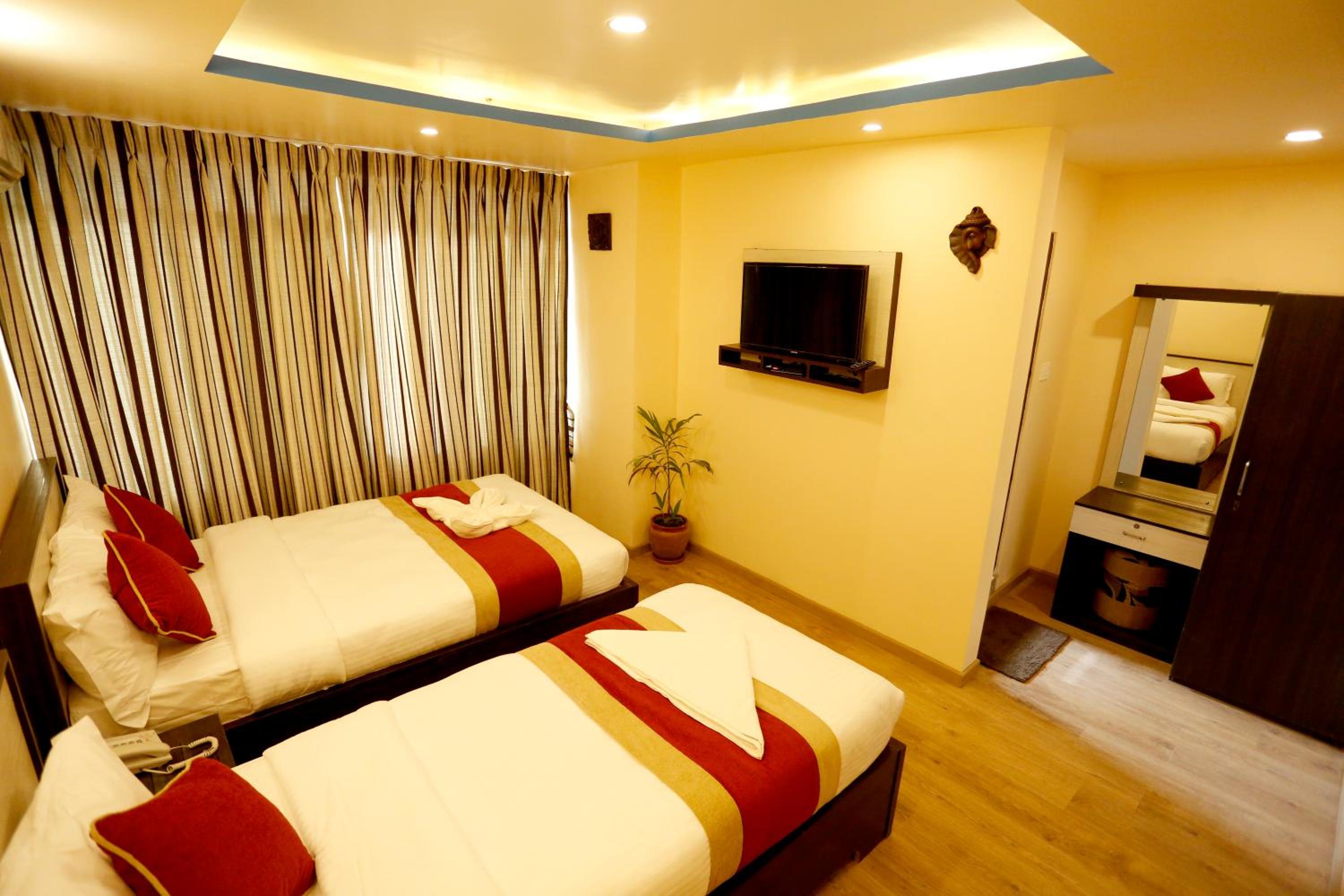 Deluxe Triple Room - Photo 11