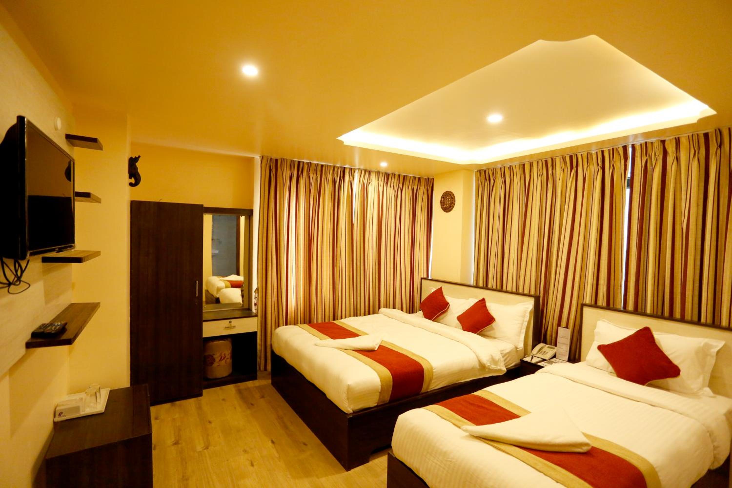 Deluxe Triple Room - Photo 18