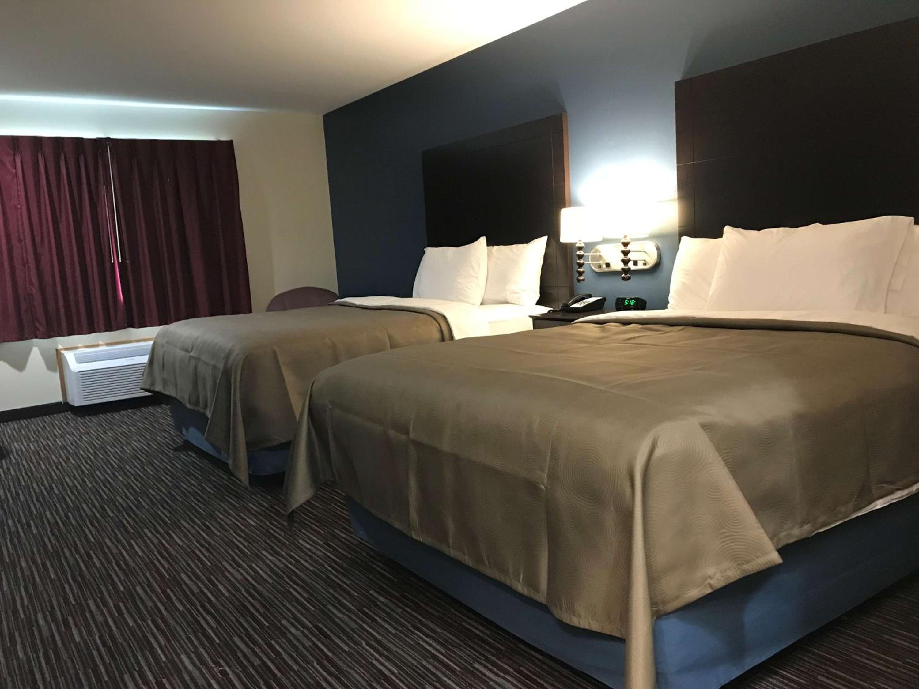 Deluxe Queen Room with Two Queen Beds - Non-Smoking photo 1