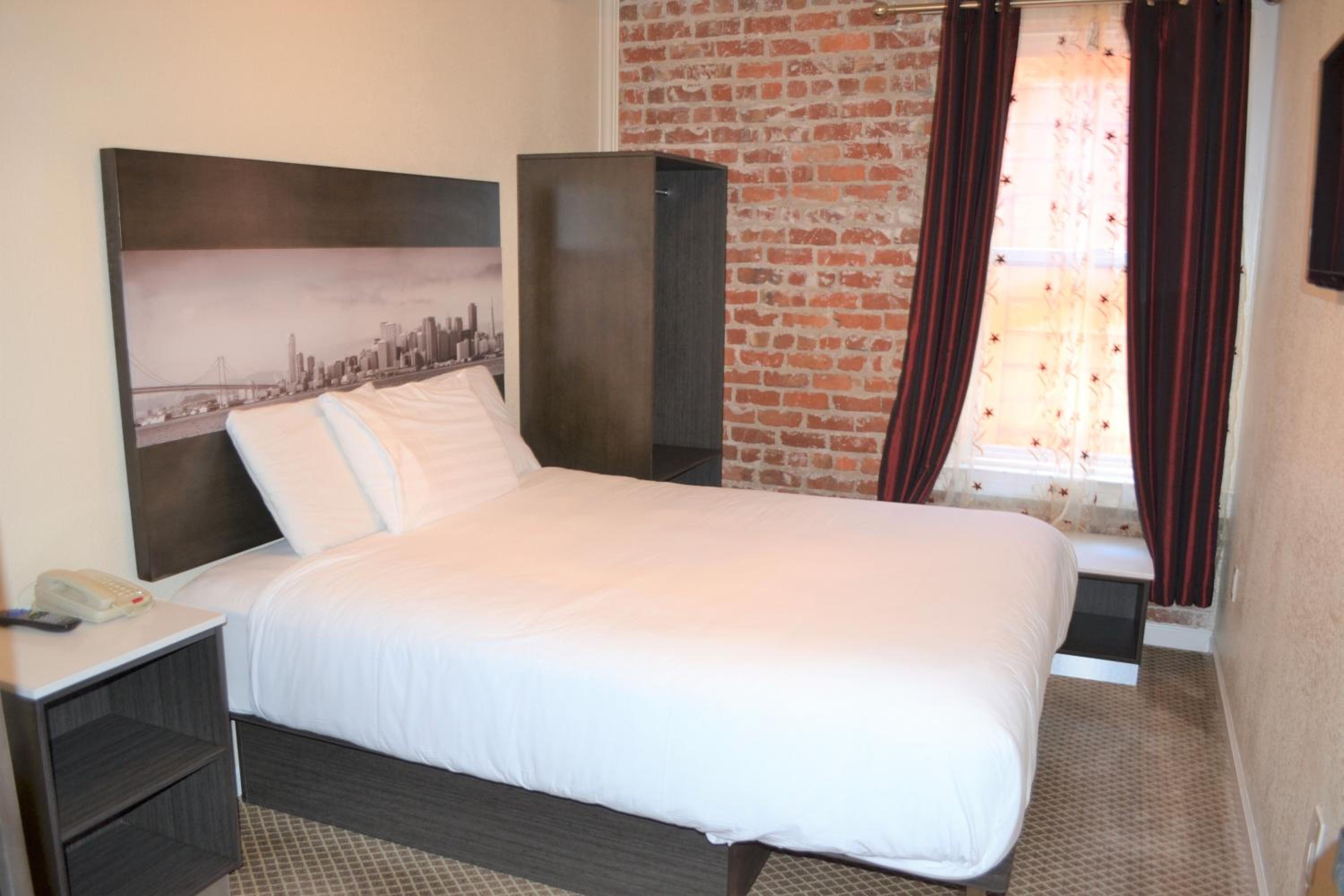 Queen Room with Shared Bathroom