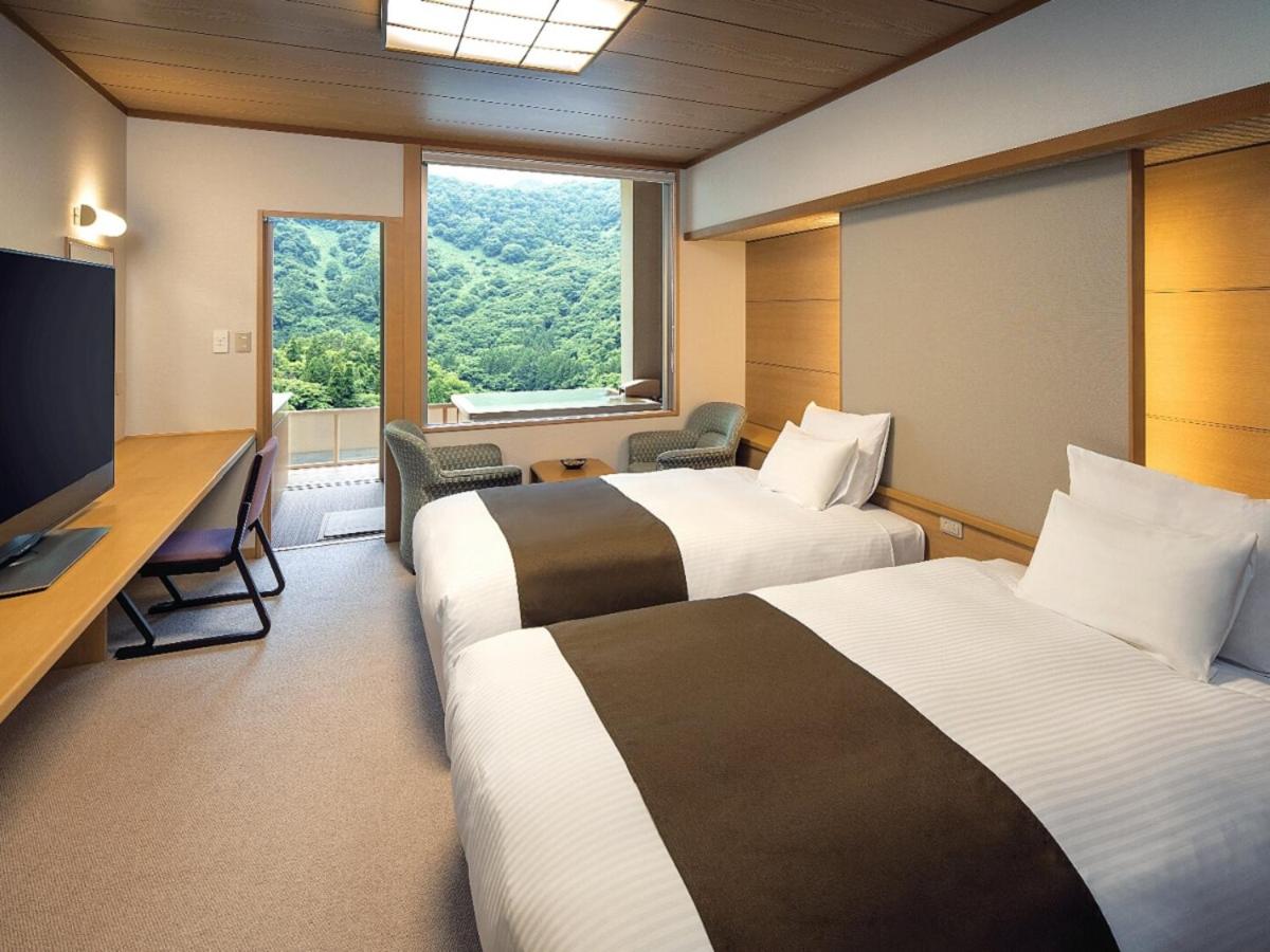 Twin Room with Private Open-Air Bath and Valley View - C - Non-Smoking photo 1