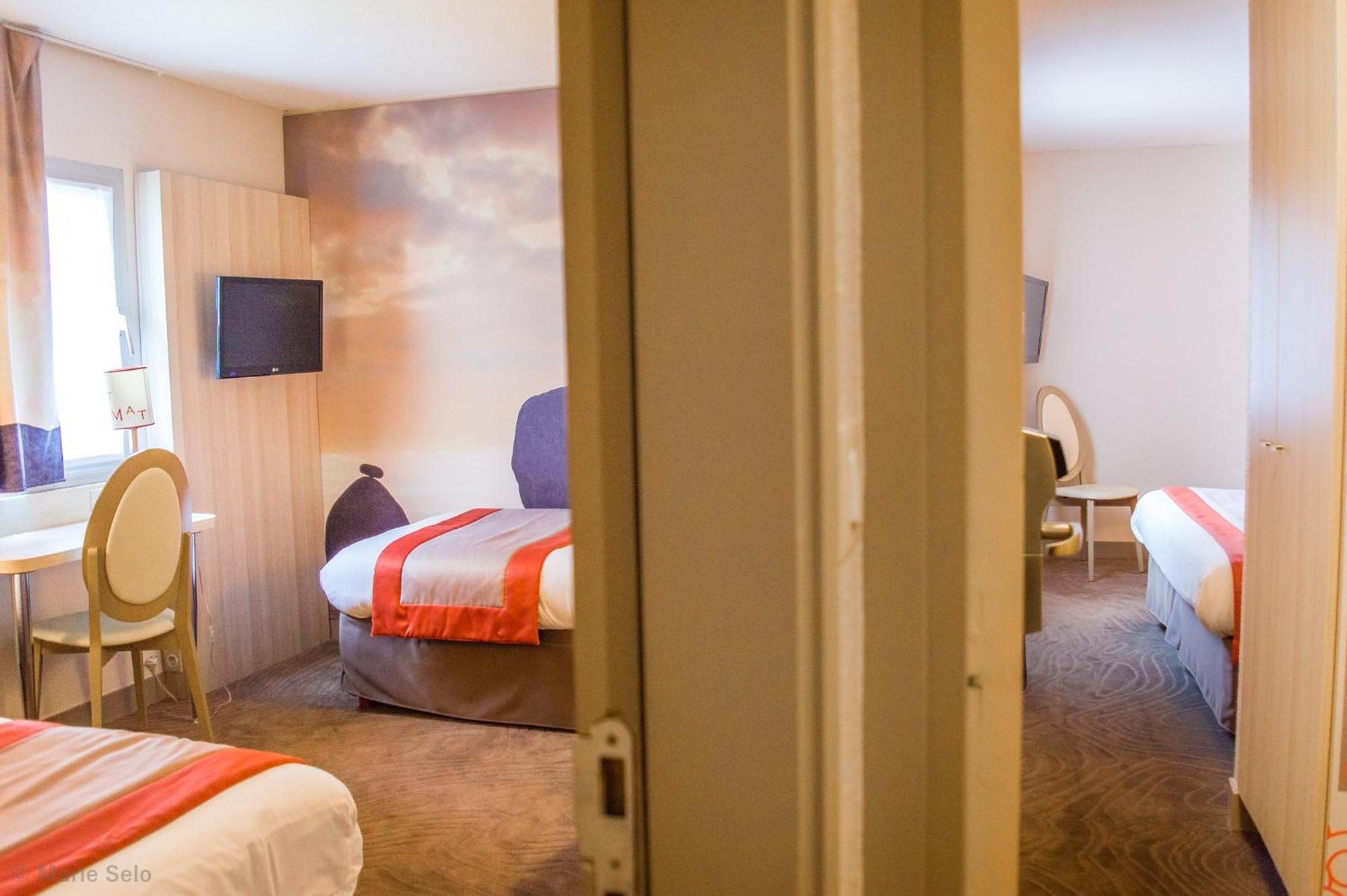 Chambre Familiale avec 1 Lit Queen-Size et 2 Lits Simples - Non-Fumeurs Chambre Familiale avec 1 Lit Queen-Size et 2 Lits Simples - Non-Fumeurs