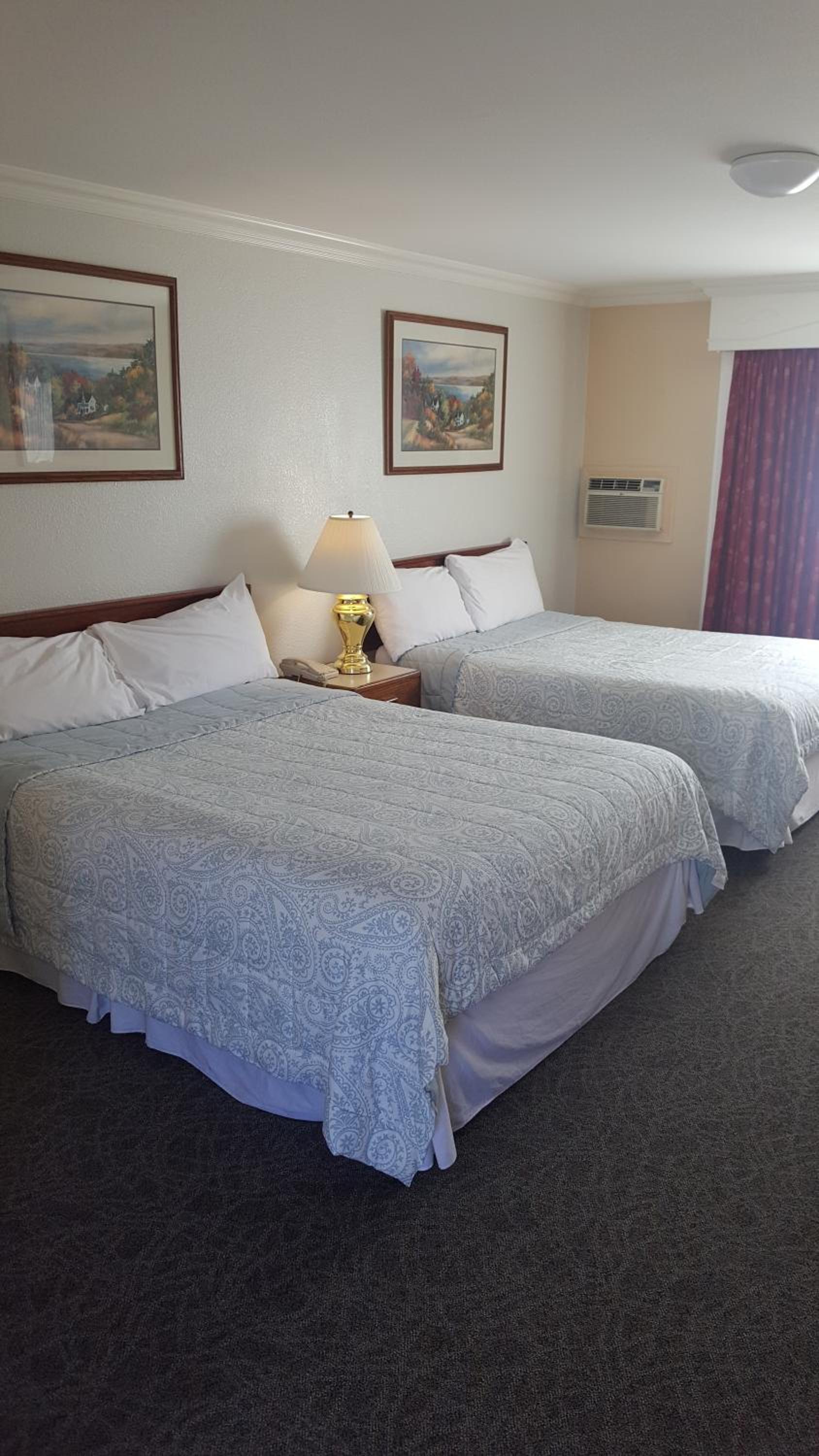 Queen Room with Two Queen Beds with Kitchenette photo 1