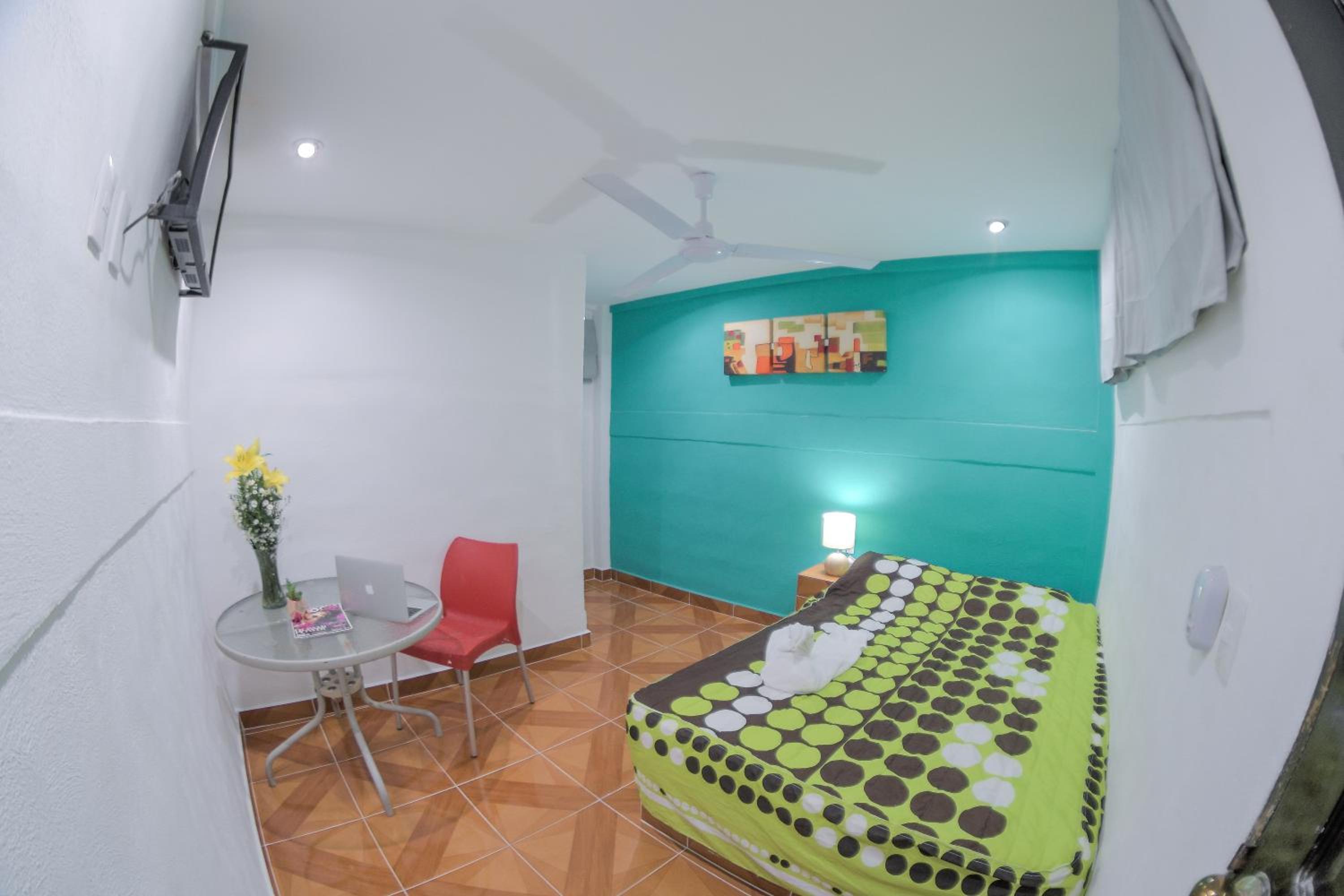 Deluxe Room (2 Adults + 1 Child) - Photo 1