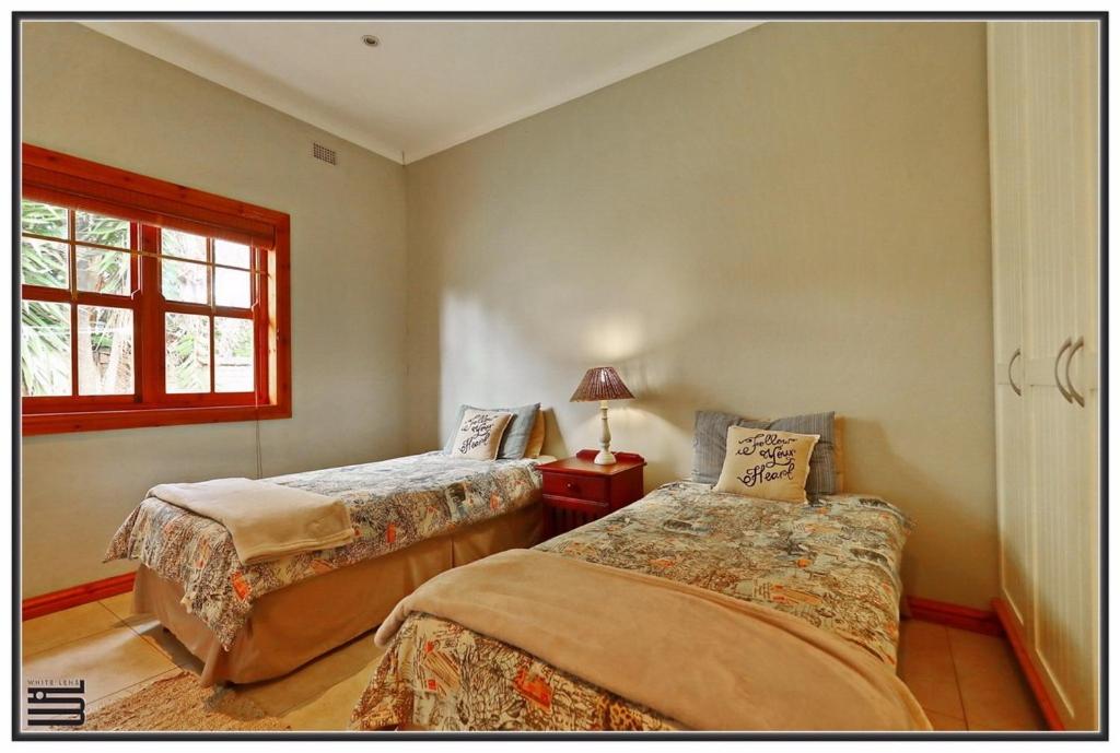 Four-Bedroom House - Photo 12