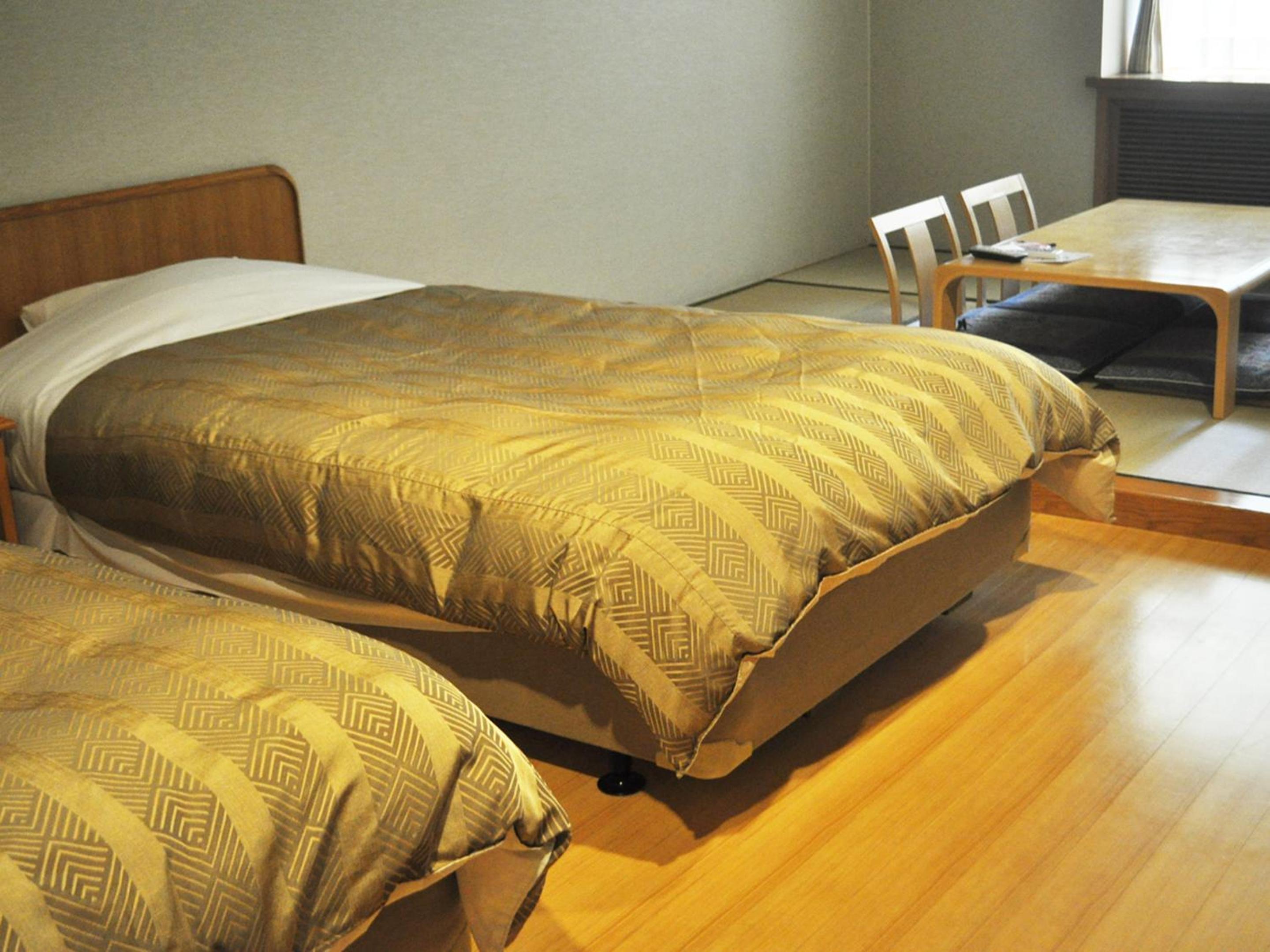 Quadruple Room with Private Bathroom photo 2