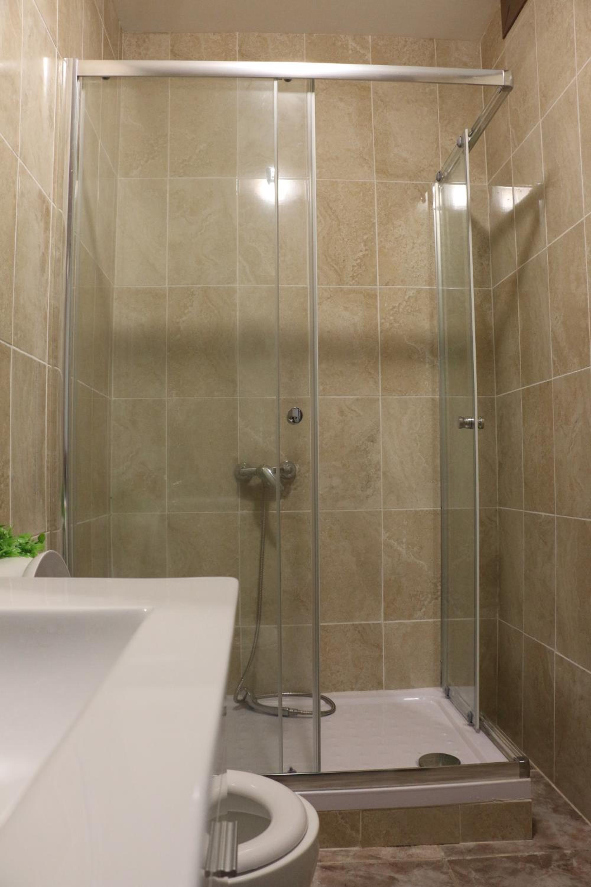 Four-Bedroom House - Photo 22
