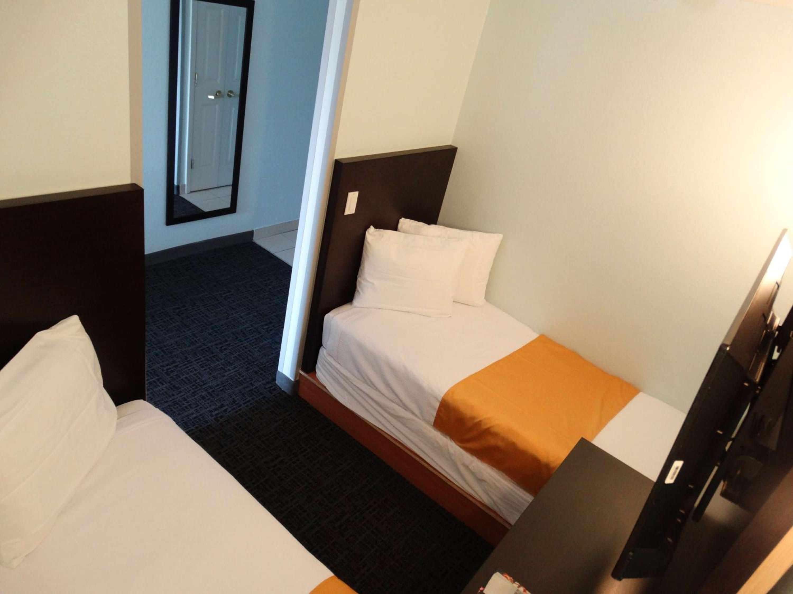 Family Room with One King Bed and Twin Beds - Photo 2