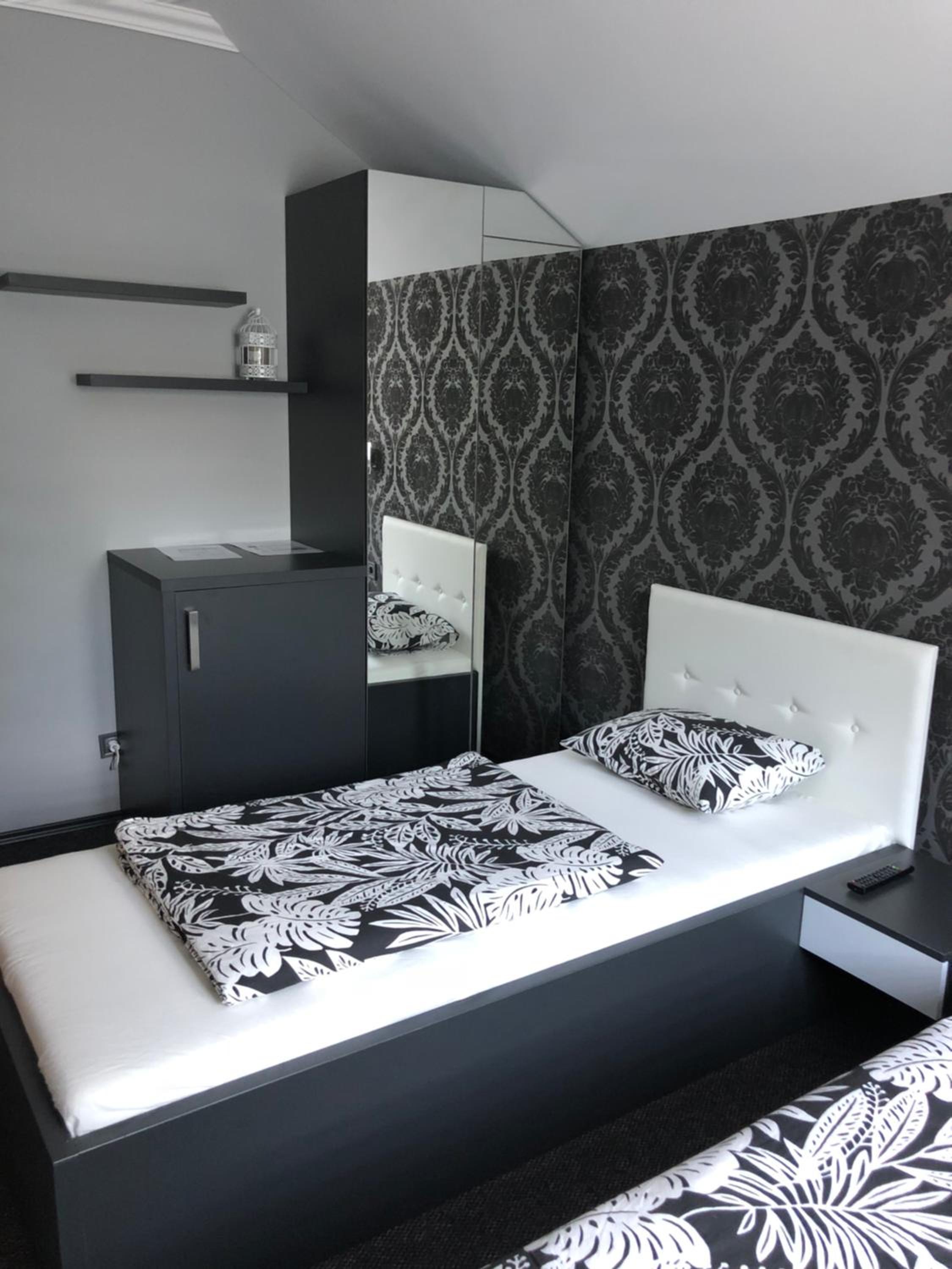 Deluxe Triple Room - Photo 7