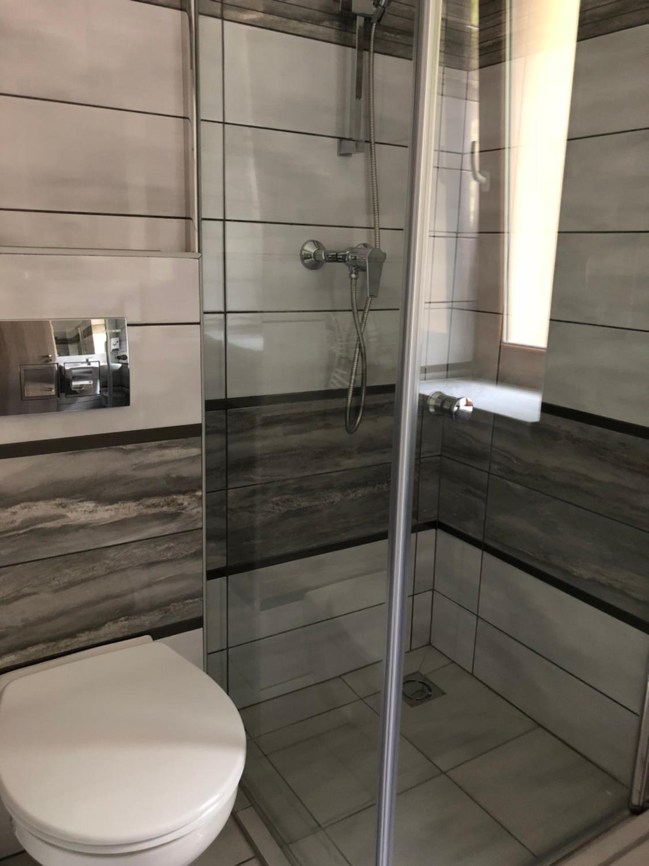 Deluxe Triple Room - Photo 11