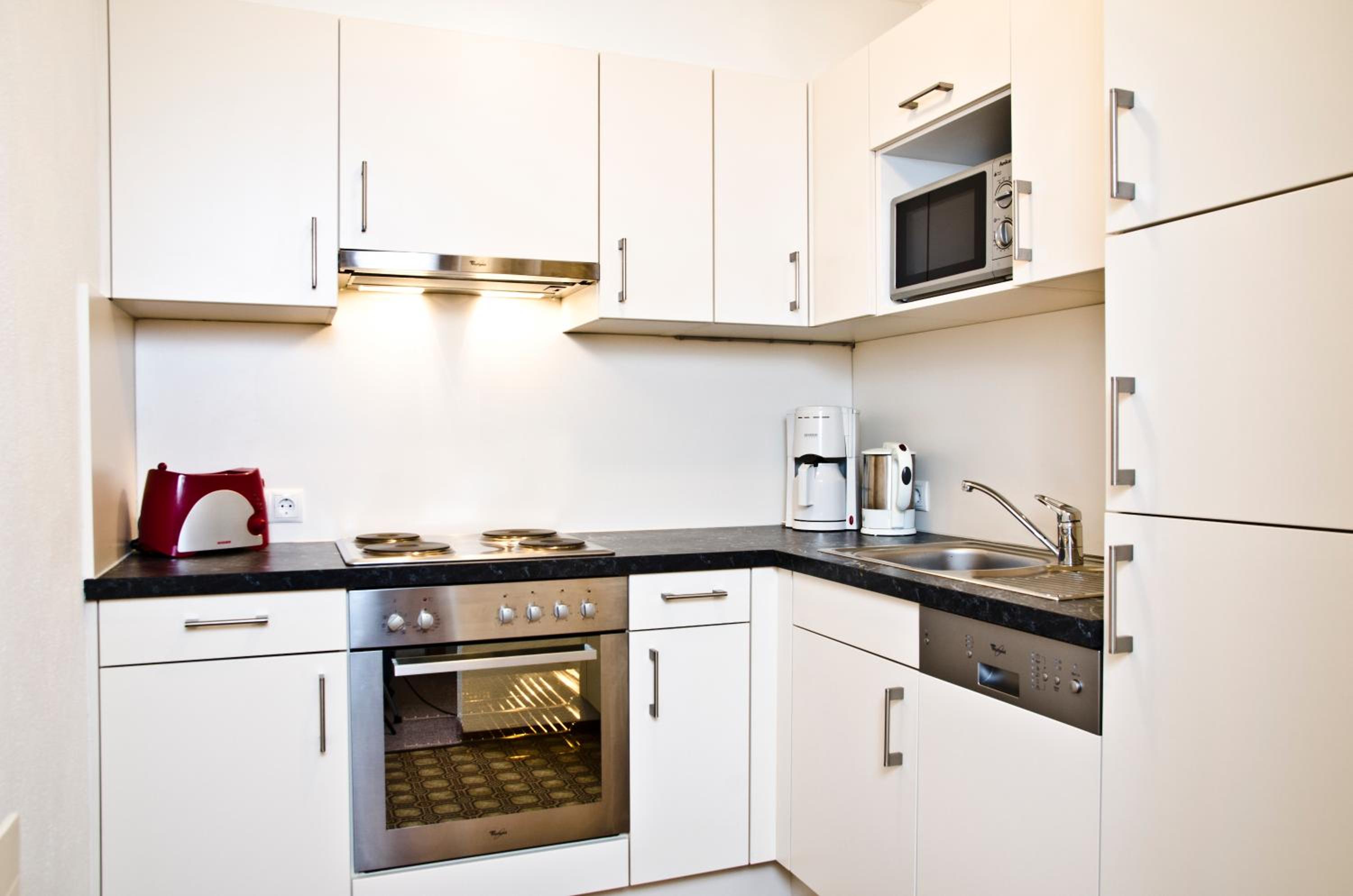 One-Bedroom Apartment (2 Adults + 2 Children) - Photo 8