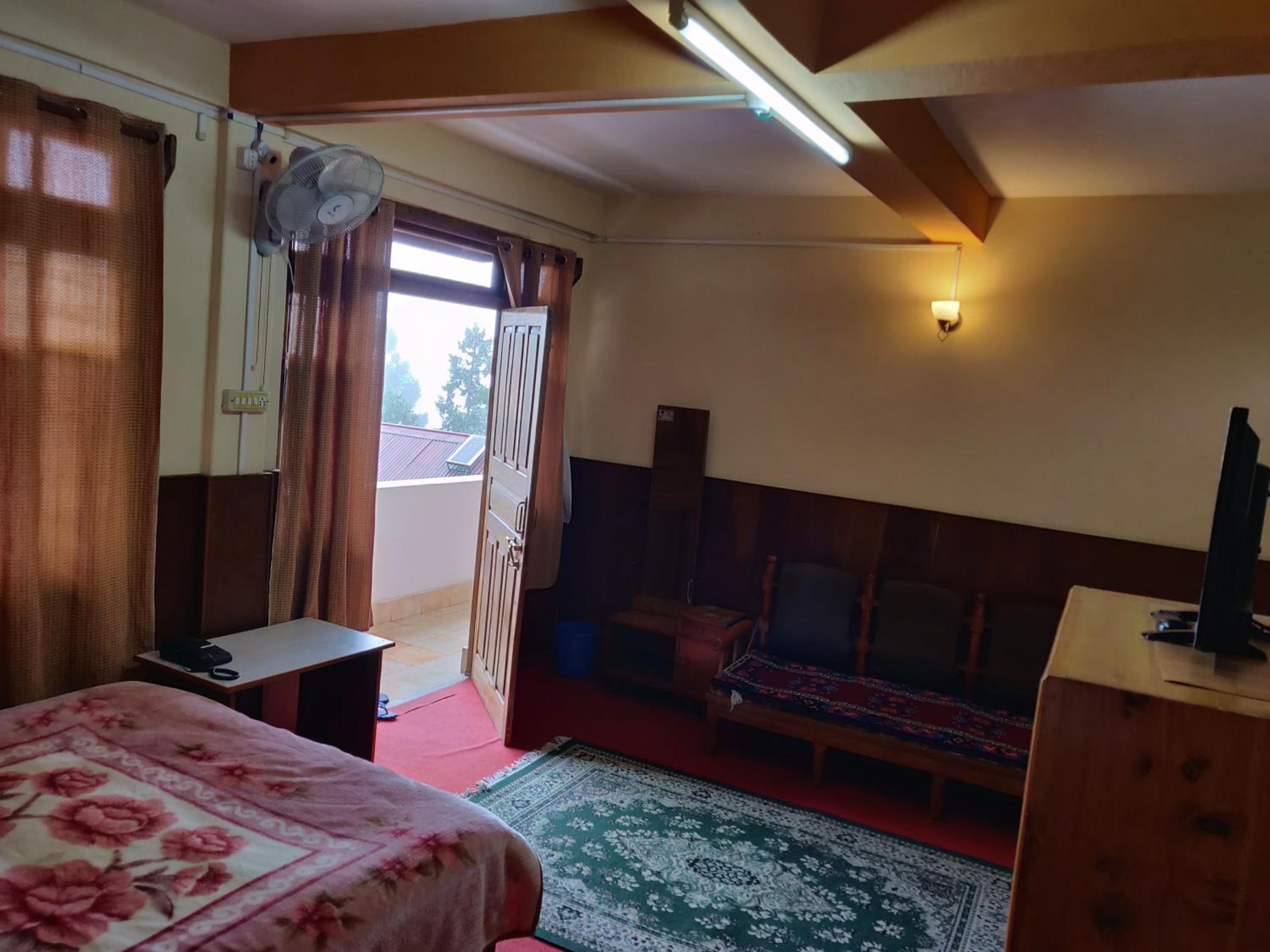 Super Deluxe Triple Room - Photo 1