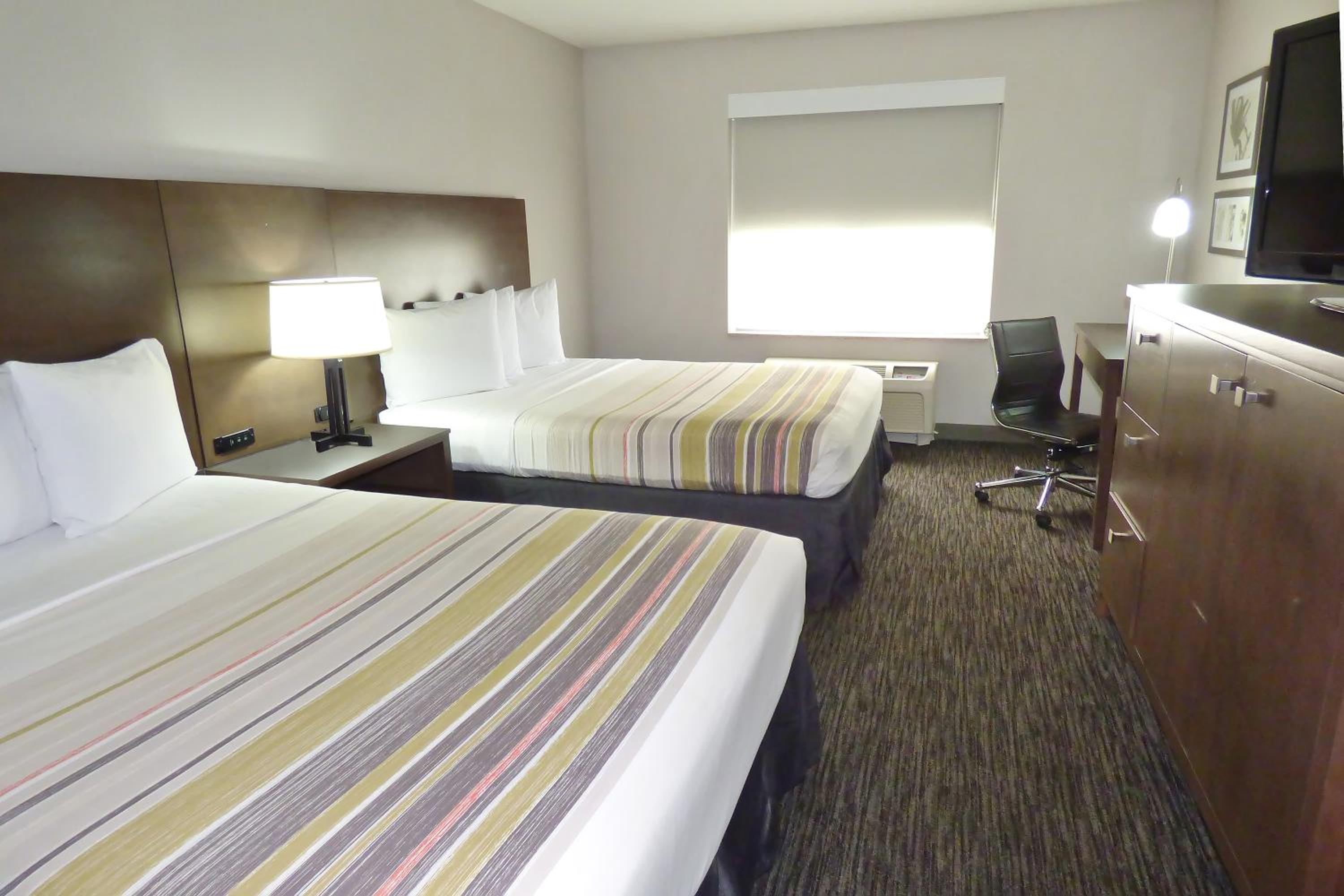 Queen Room with Two Queen Beds - Photo 1
