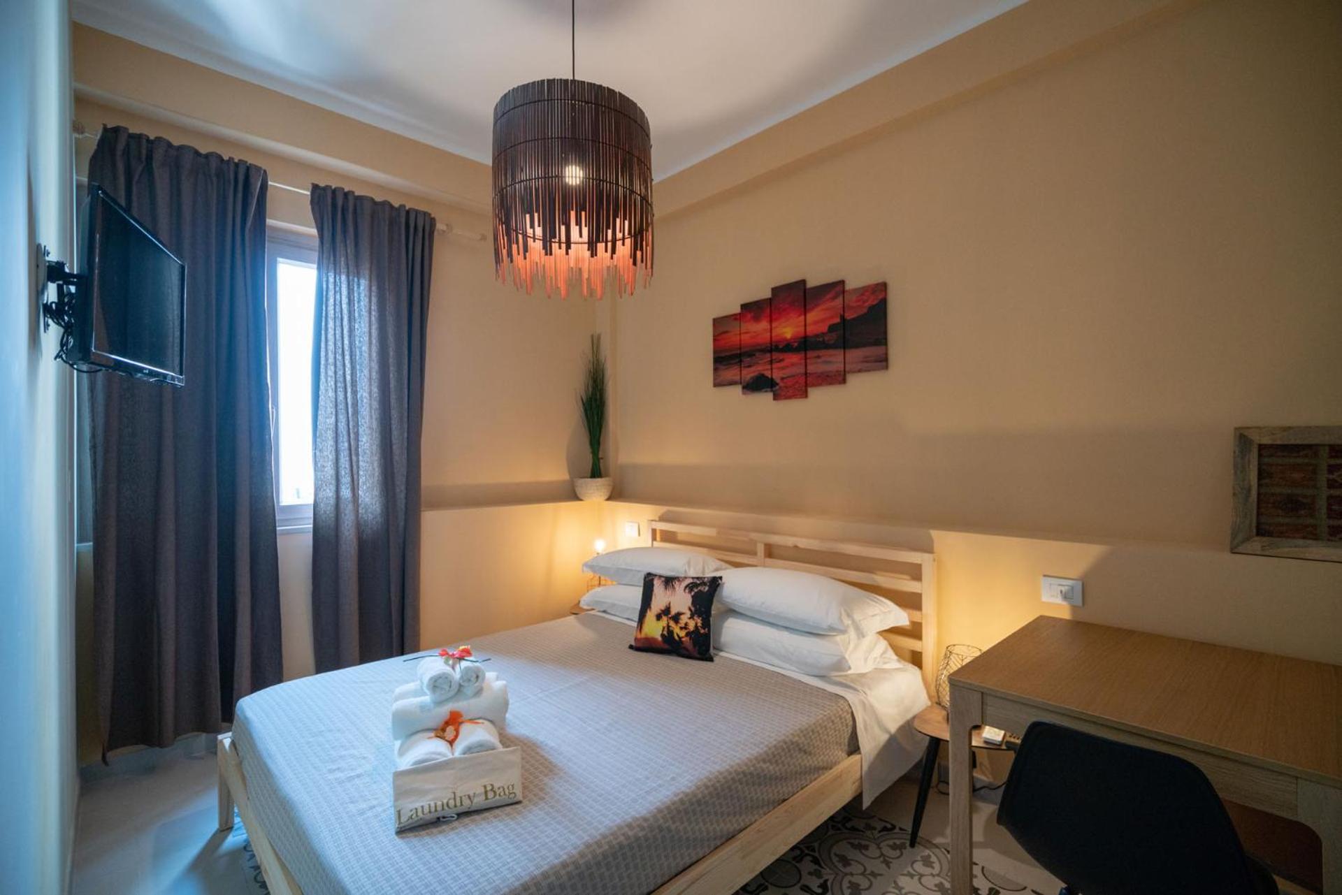 Quadruple Room with Private Bathroom - Photo 1