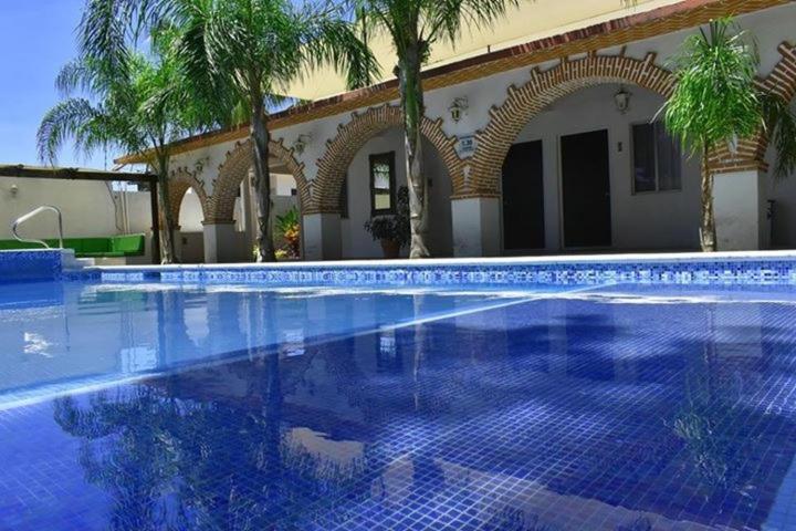 Queen Room with Pool View - Photo 3