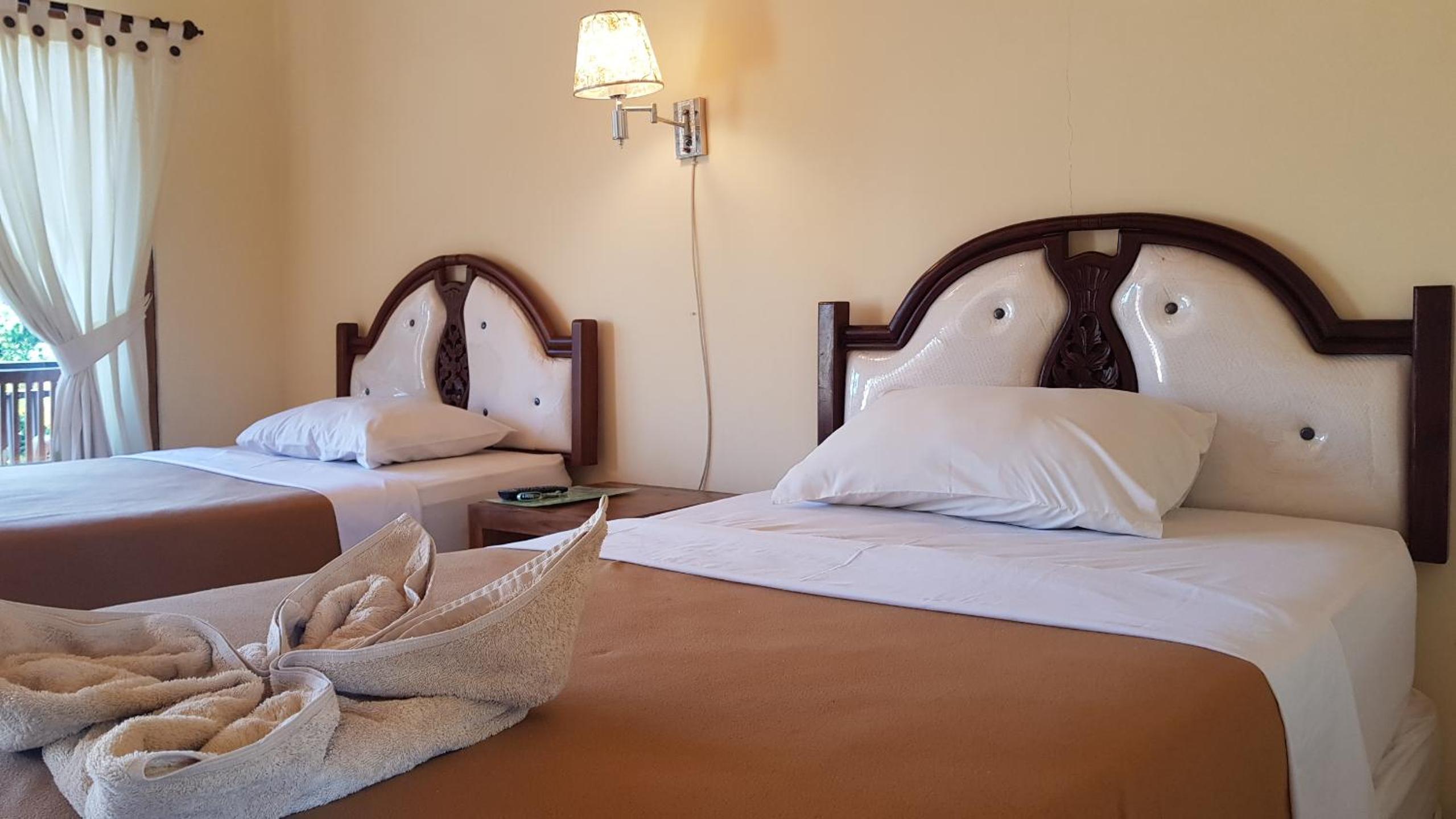 Standard Twin Room - Photo 4