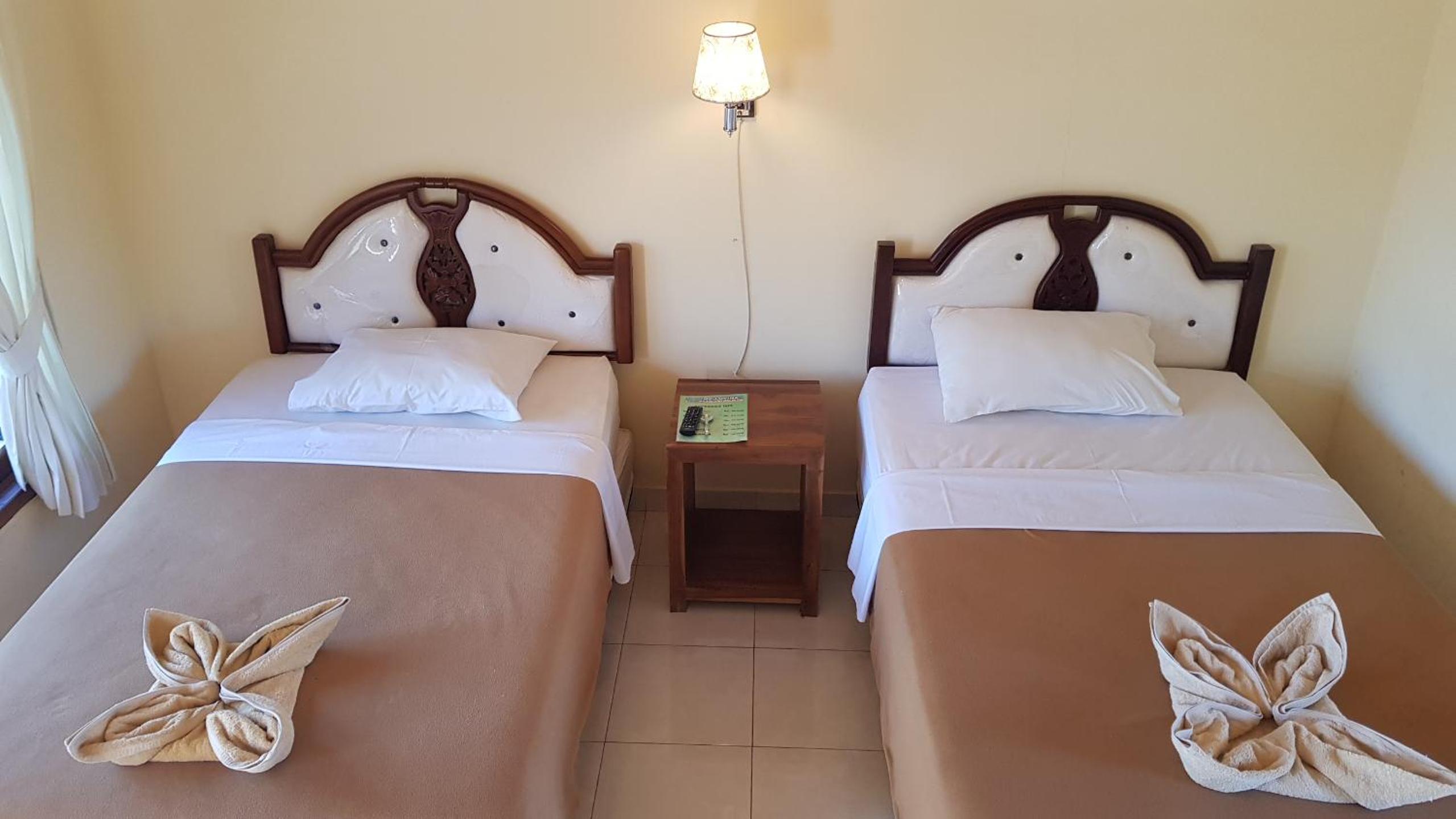 Standard Twin Room - Photo 3