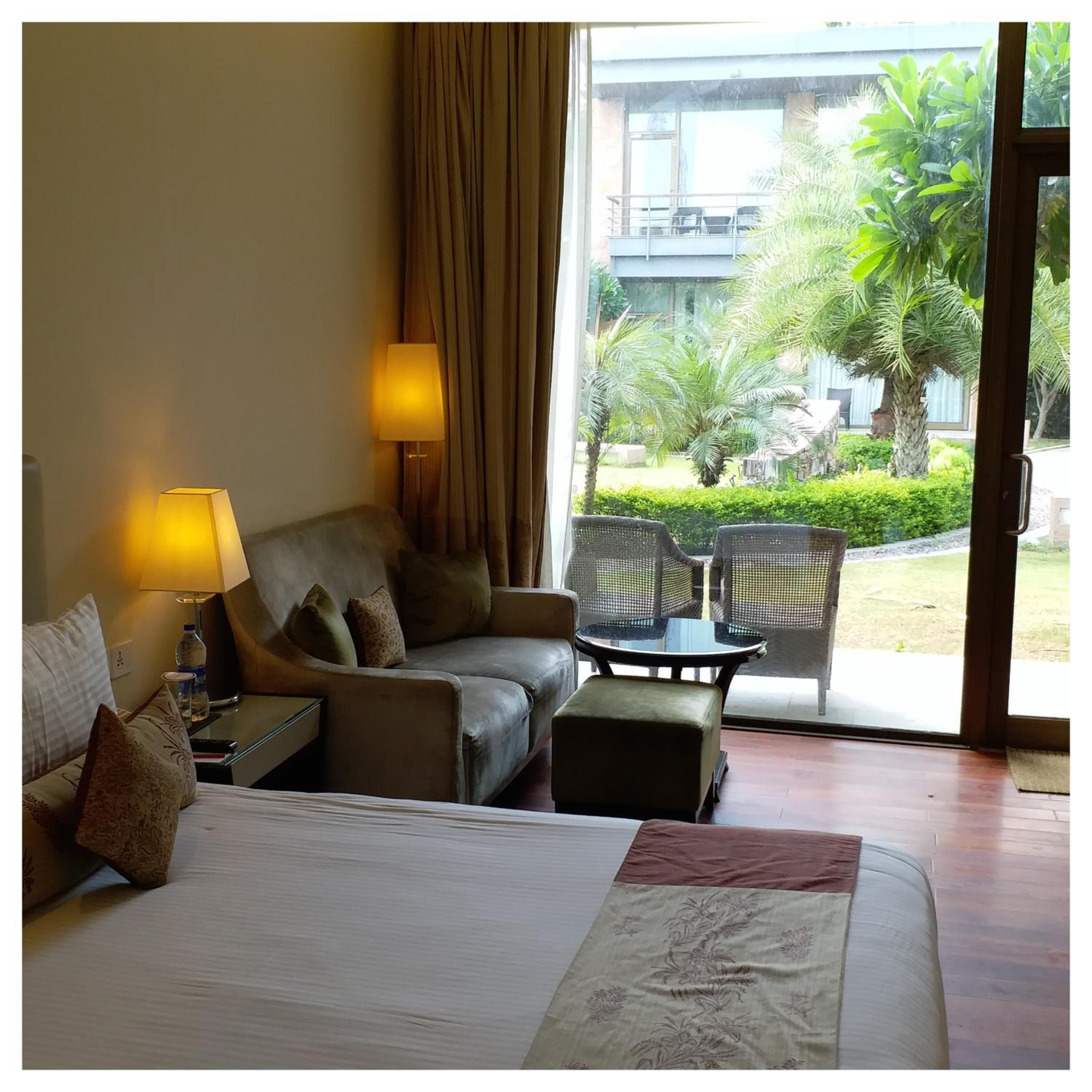 Luxury Room Courtyard View with Sit Out – King Bed at Taj Damdama Lake Resort & Spa, Gurugram