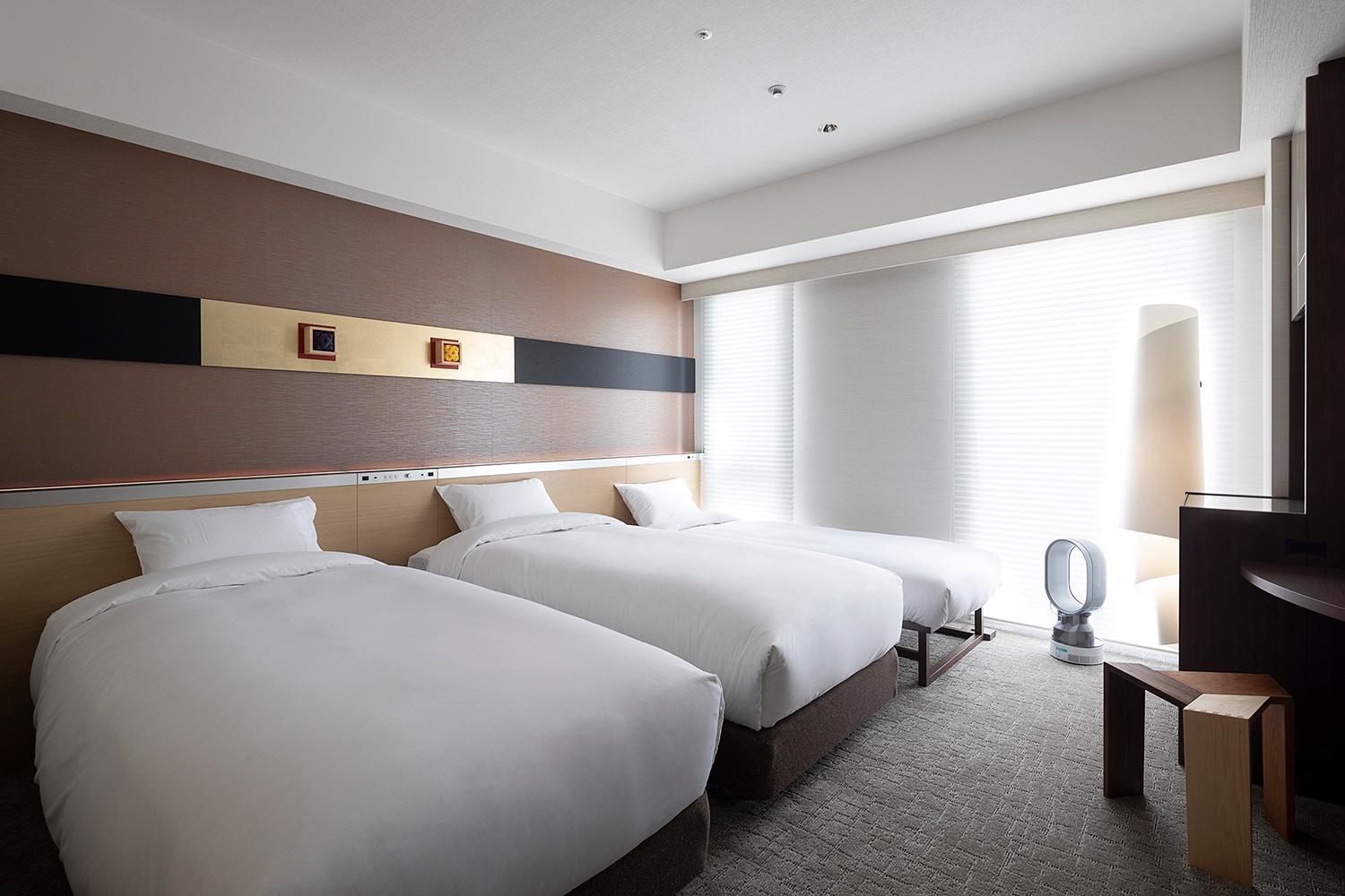 Superior Twin Room with Sofa Bed ( 2 Single beds and 1 Sofa bed) - Non-Smoking photo 1