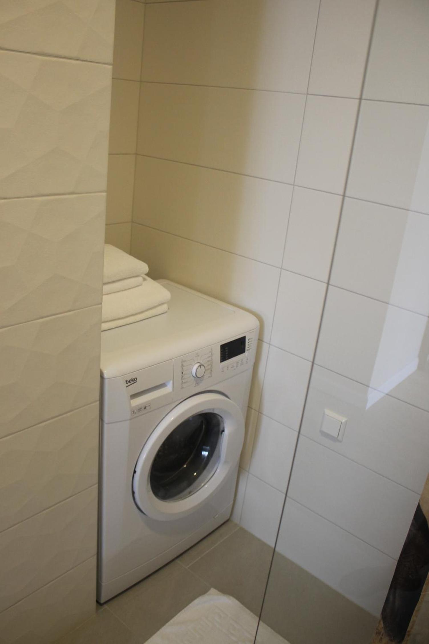 Deluxe Apartment with Laisves avenue view - Photo 21