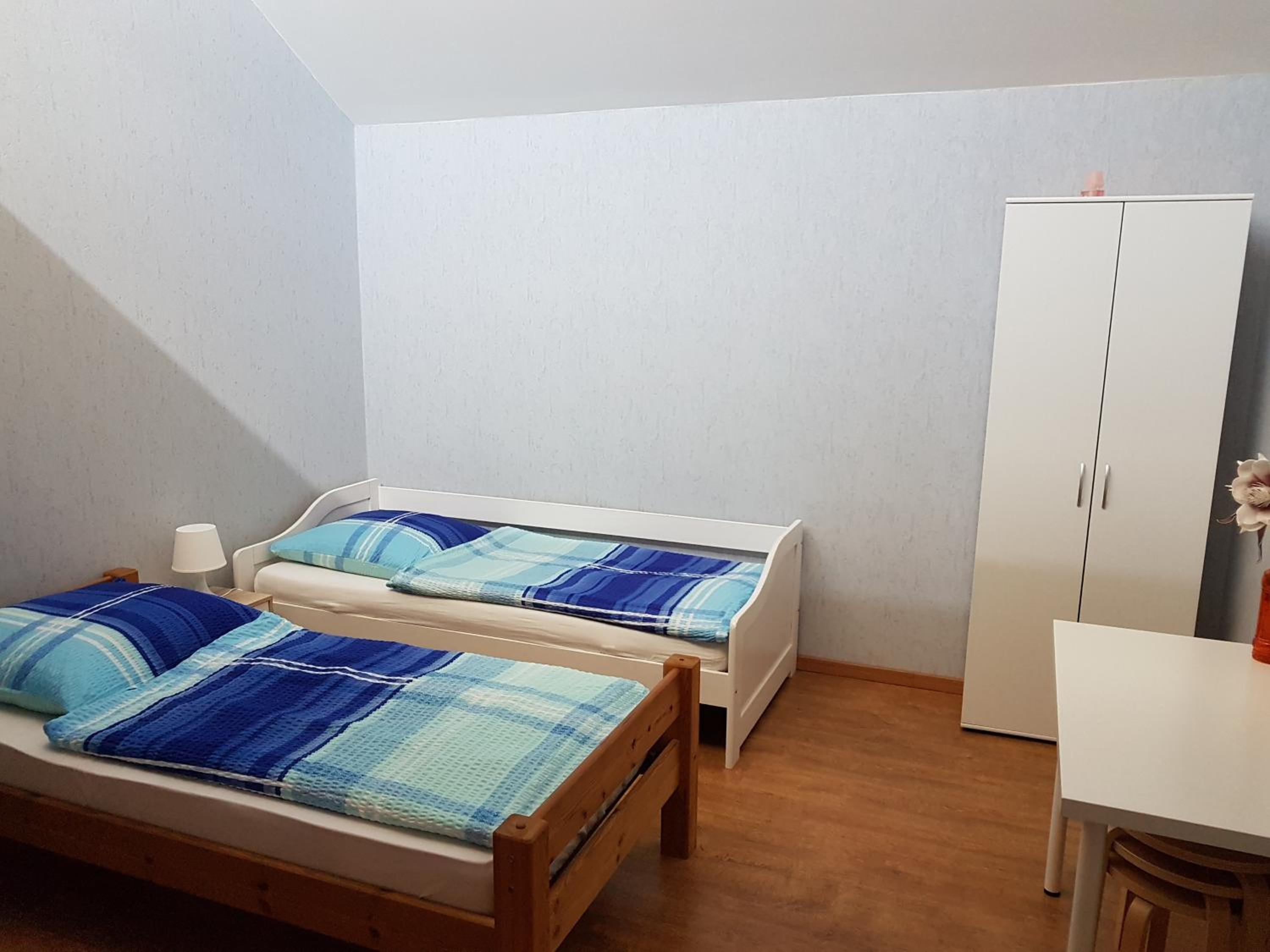 Basic Triple Room with Shared Bathroom photo 3